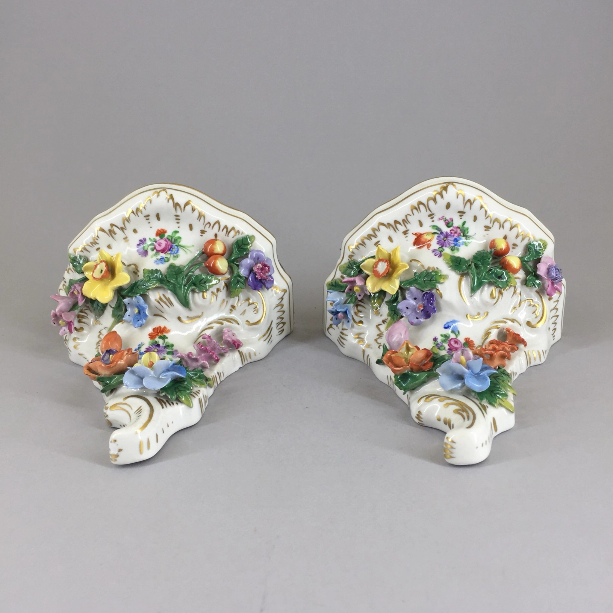 Pair of porcelain consoles. PS Dresden