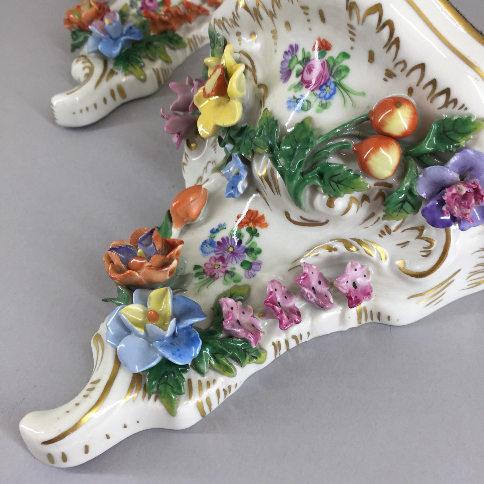 Pair of porcelain consoles. PS Dresden