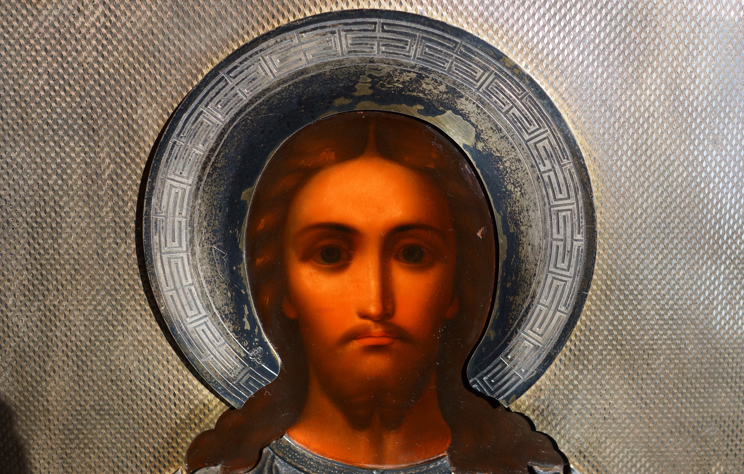 An ancient image of the Savior in an exquisite silver setting with enamel. Russia, Moscow, 1890. 