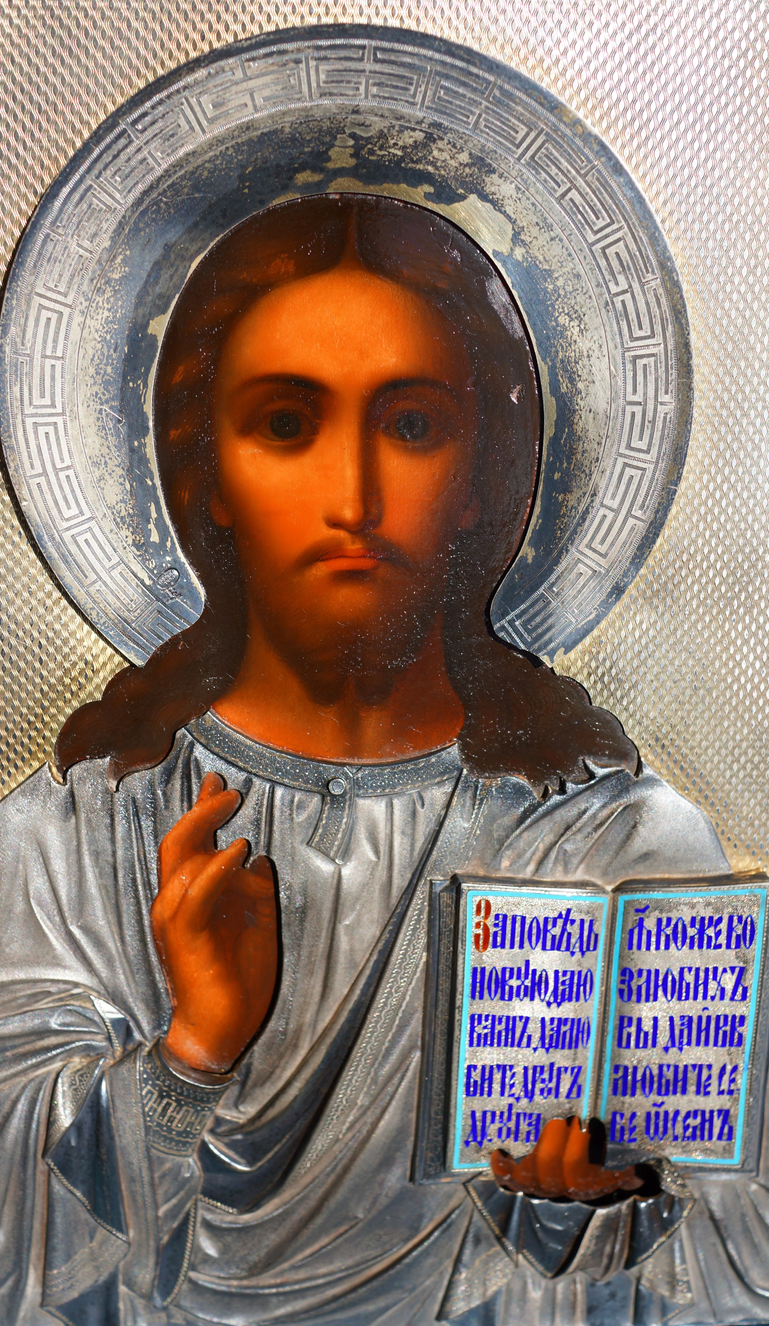 An ancient image of the Savior in an exquisite silver setting with enamel. Russia, Moscow, 1890. 