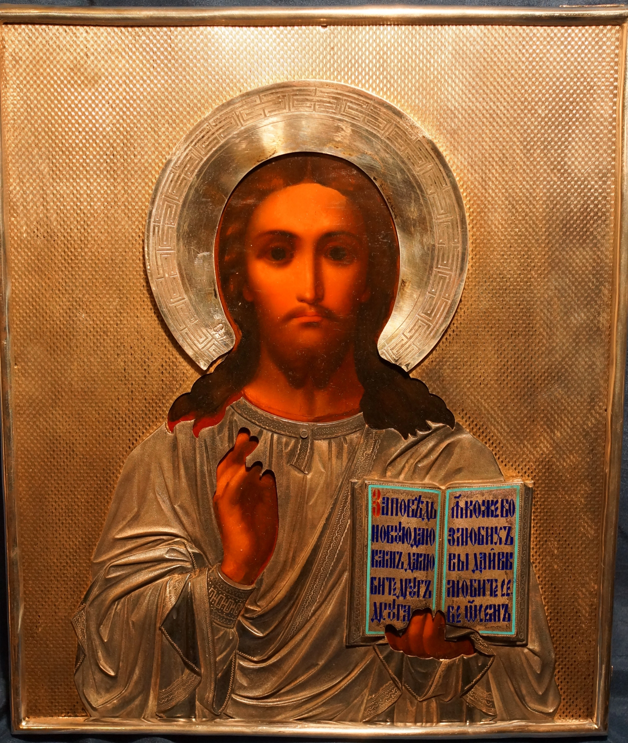 An ancient image of the Savior in an exquisite silver setting with enamel. Russia, Moscow, 1890. 