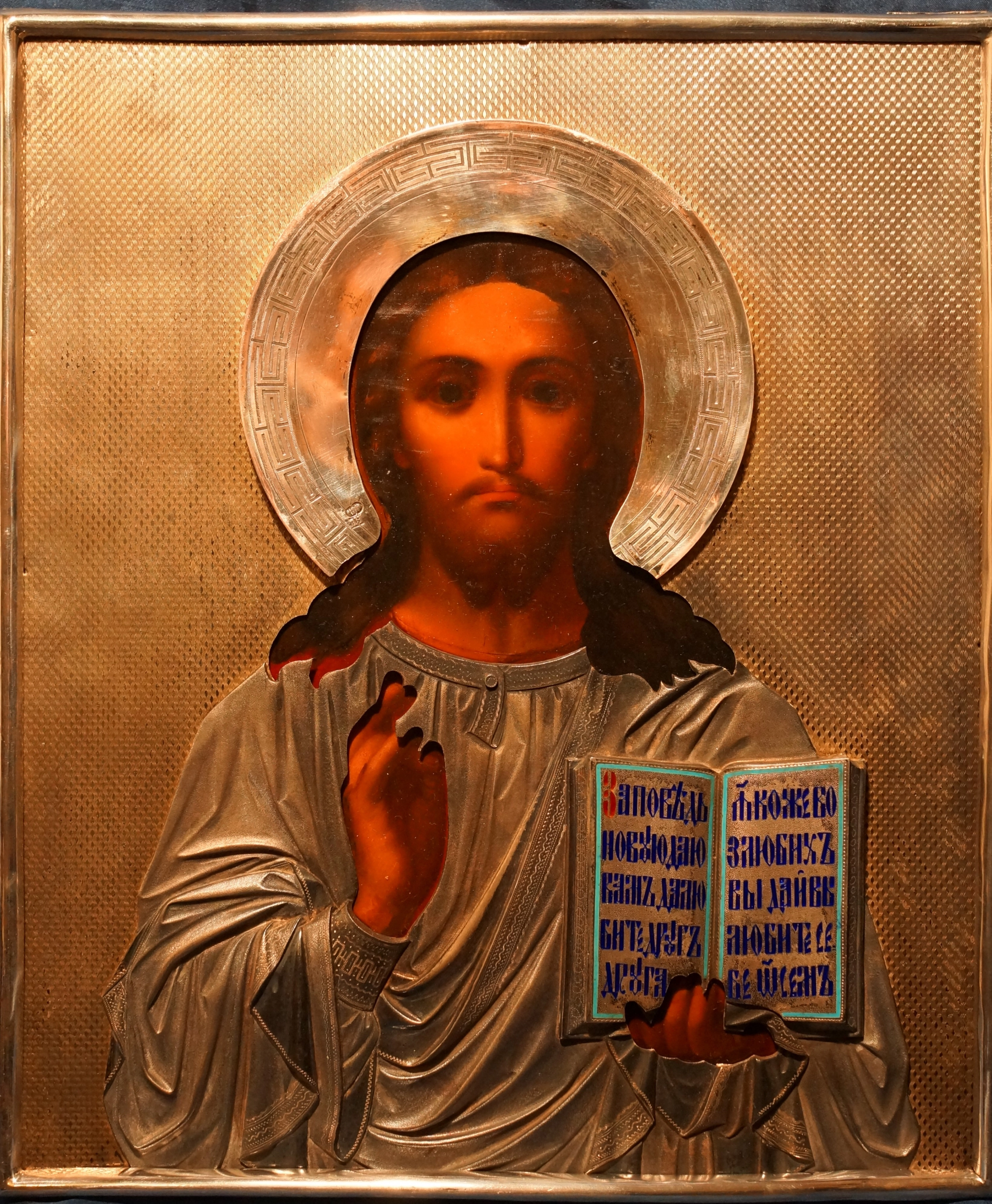 An ancient image of the Savior in an exquisite silver setting with enamel. Russia, Moscow, 1890. 