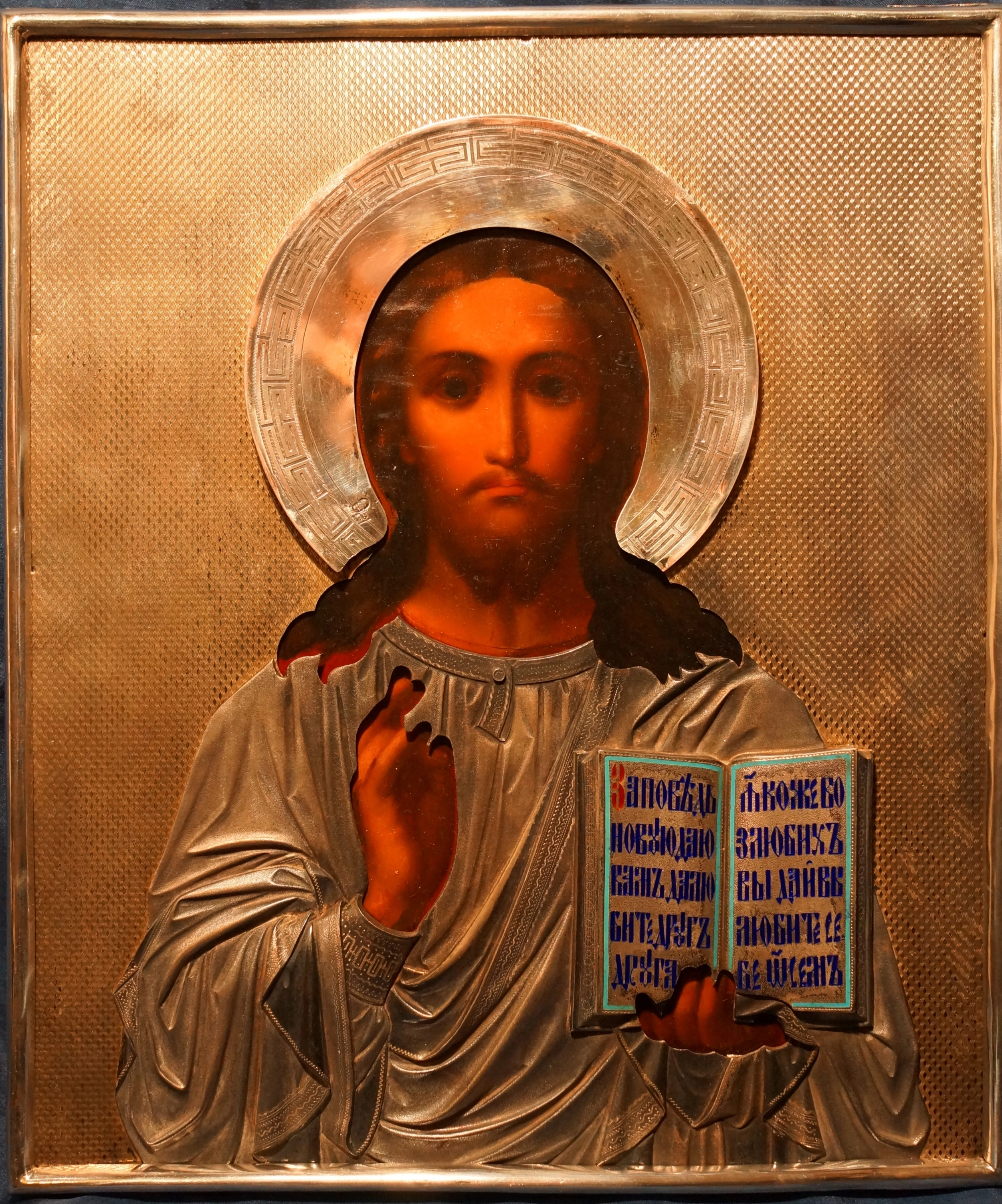 An ancient image of the Savior in an exquisite silver setting with enamel. Russia, Moscow, 1890. 