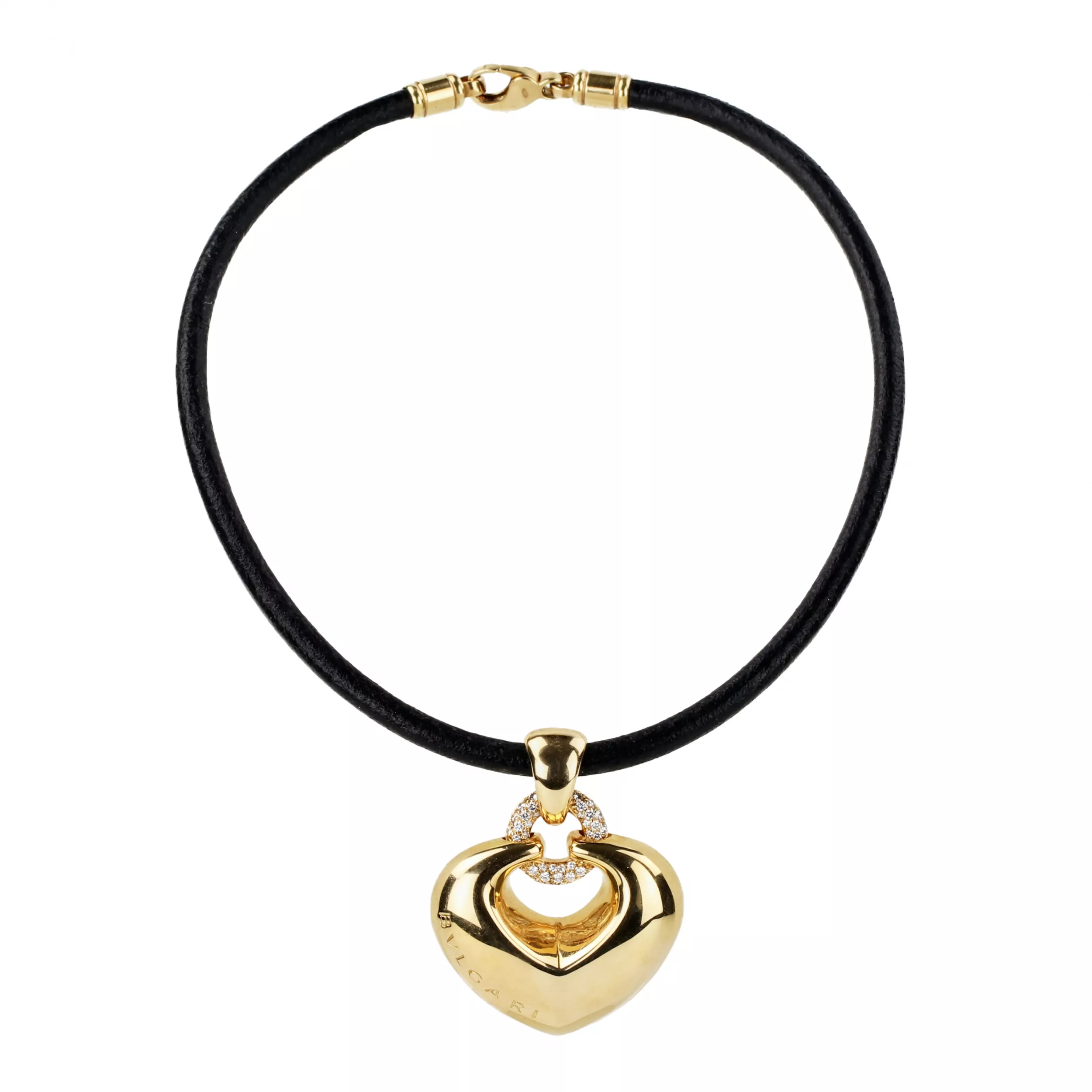 Pendentif Bulgari en or avec diamants, en forme de cœur sur un bracelet en caoutchouc. 