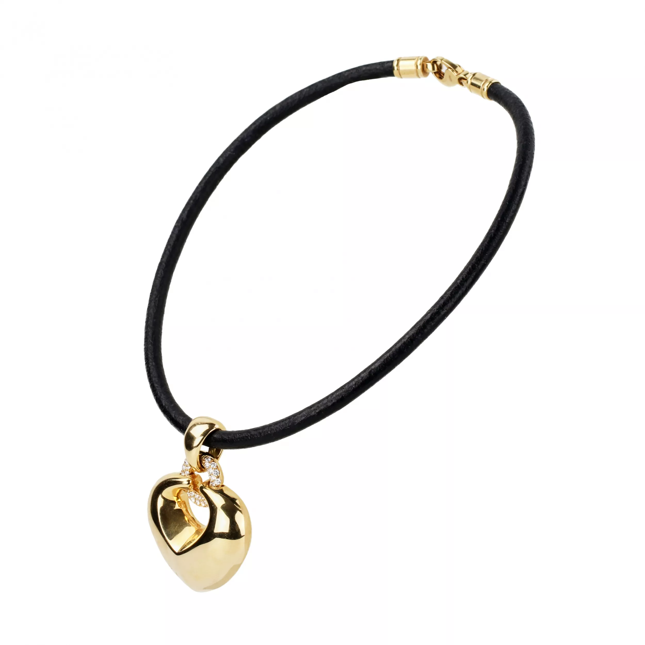 Pendentif Bulgari en or avec diamants, en forme de cœur sur un bracelet en caoutchouc. 