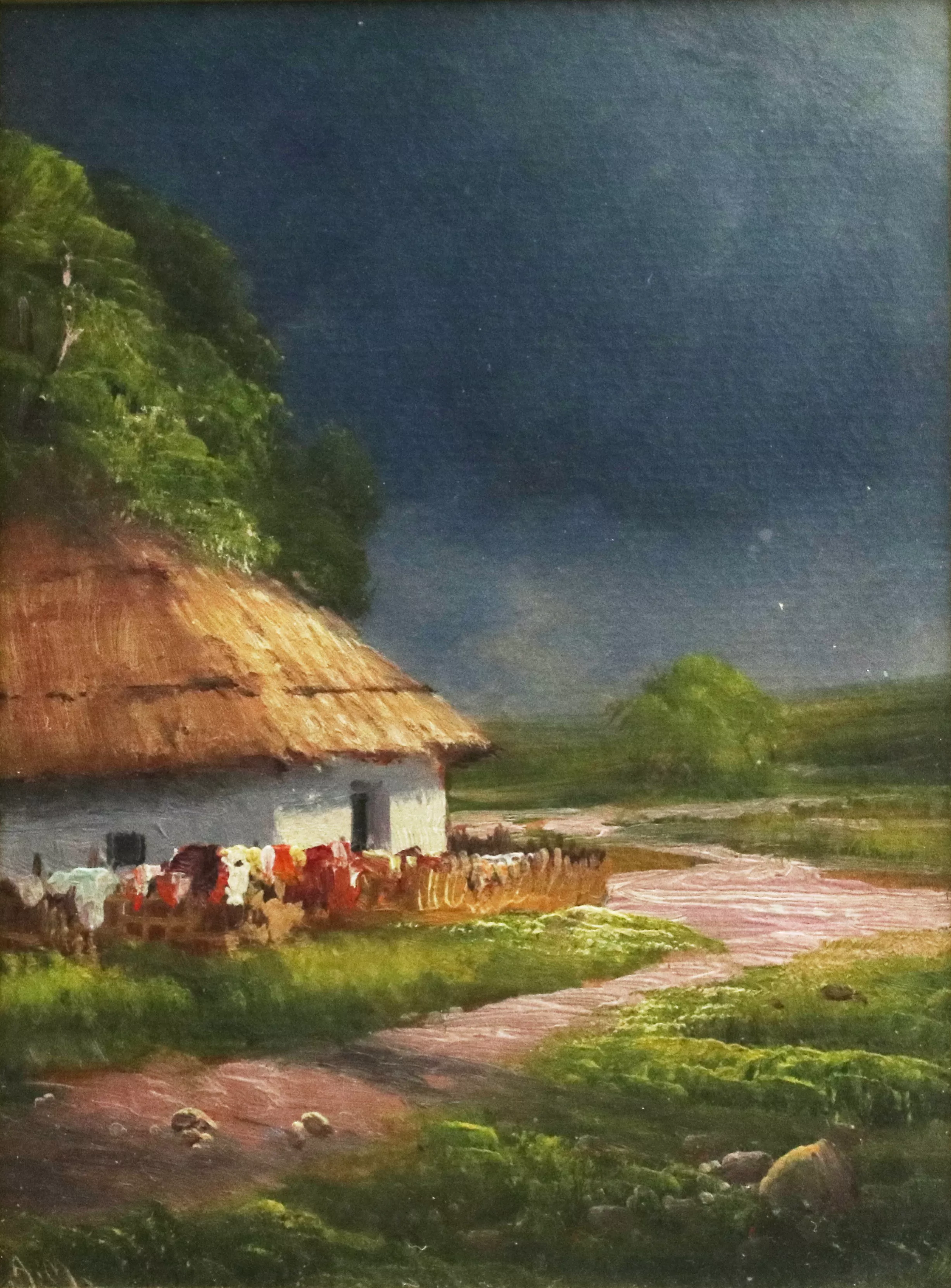 Avant la pluie Vue sur la route de campagne et la cabane ukrainienne. 