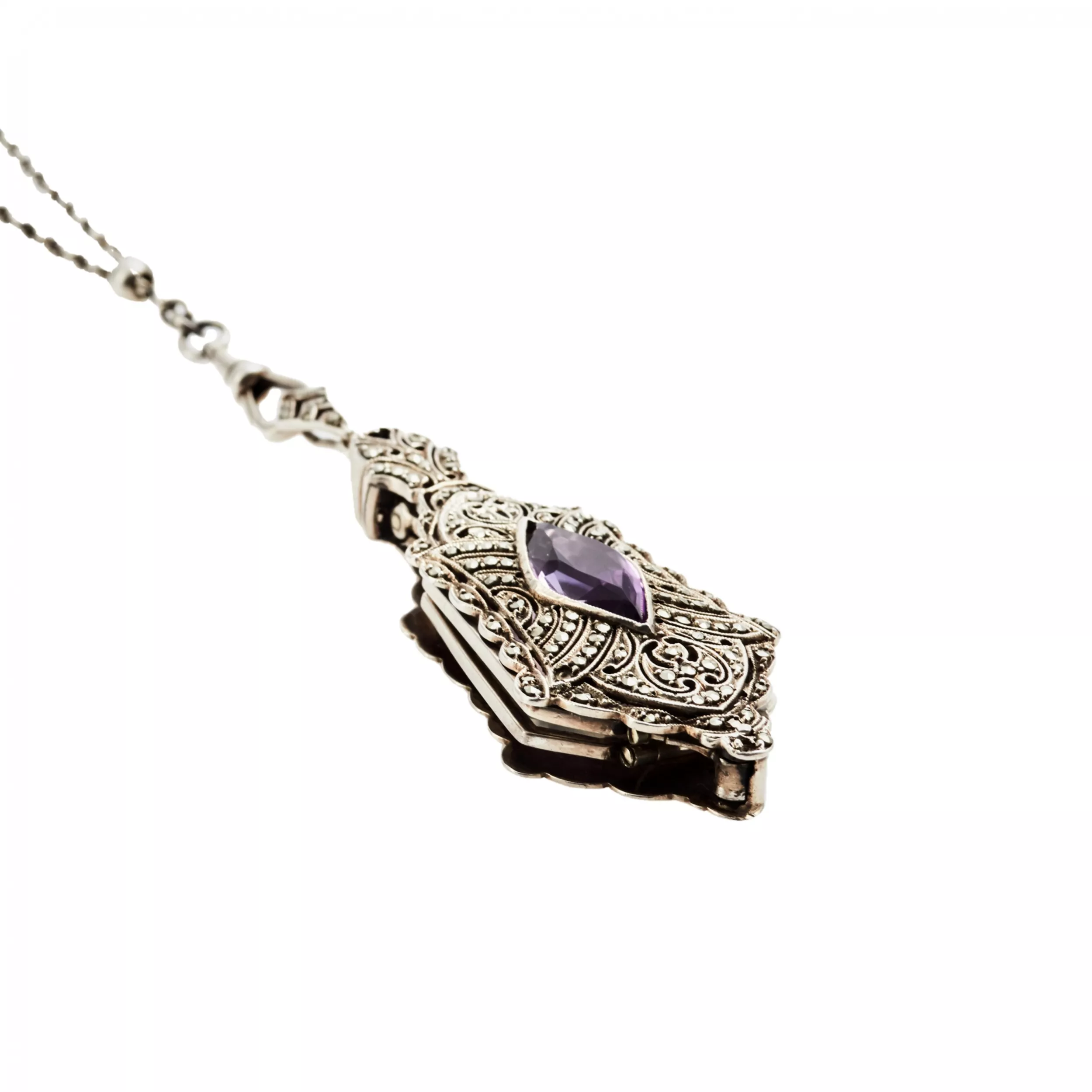 Pendentif lorgnette en argent sur chaîne Platinin. 