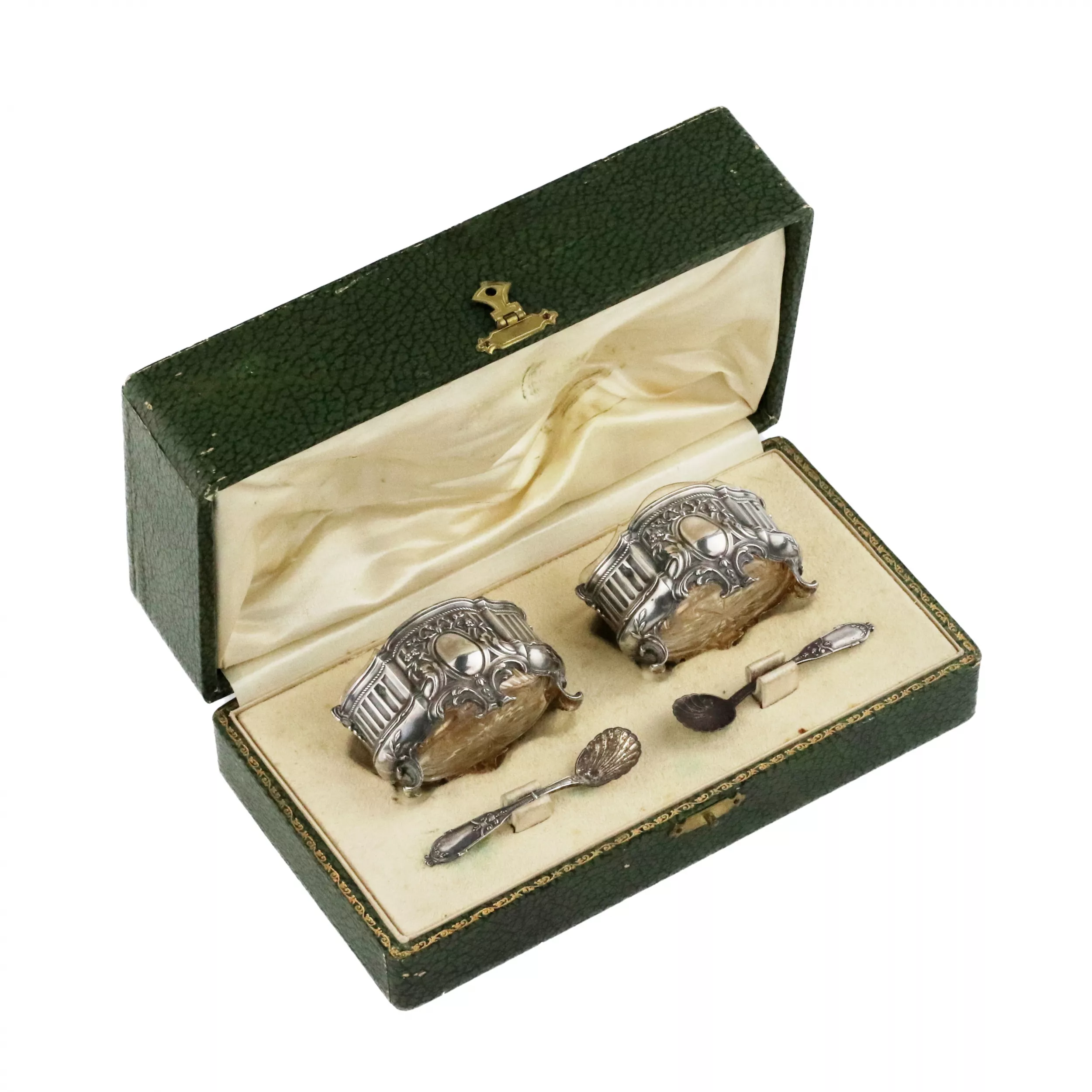 Pair of Louis XV style silver salt shakers. With spoons and original case. 