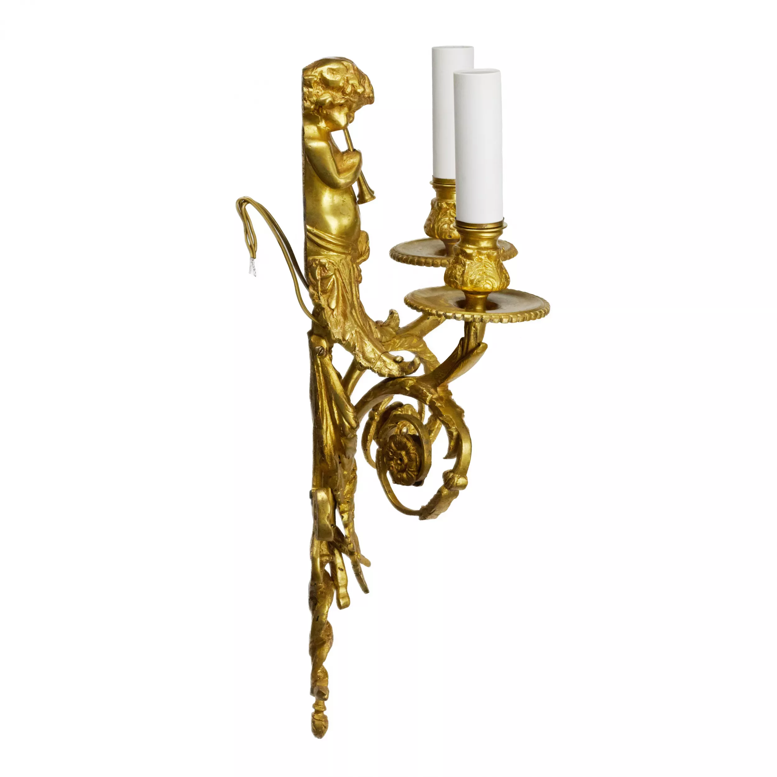 Four intricate gilded sconces with currency curls crowned with cherubs. 