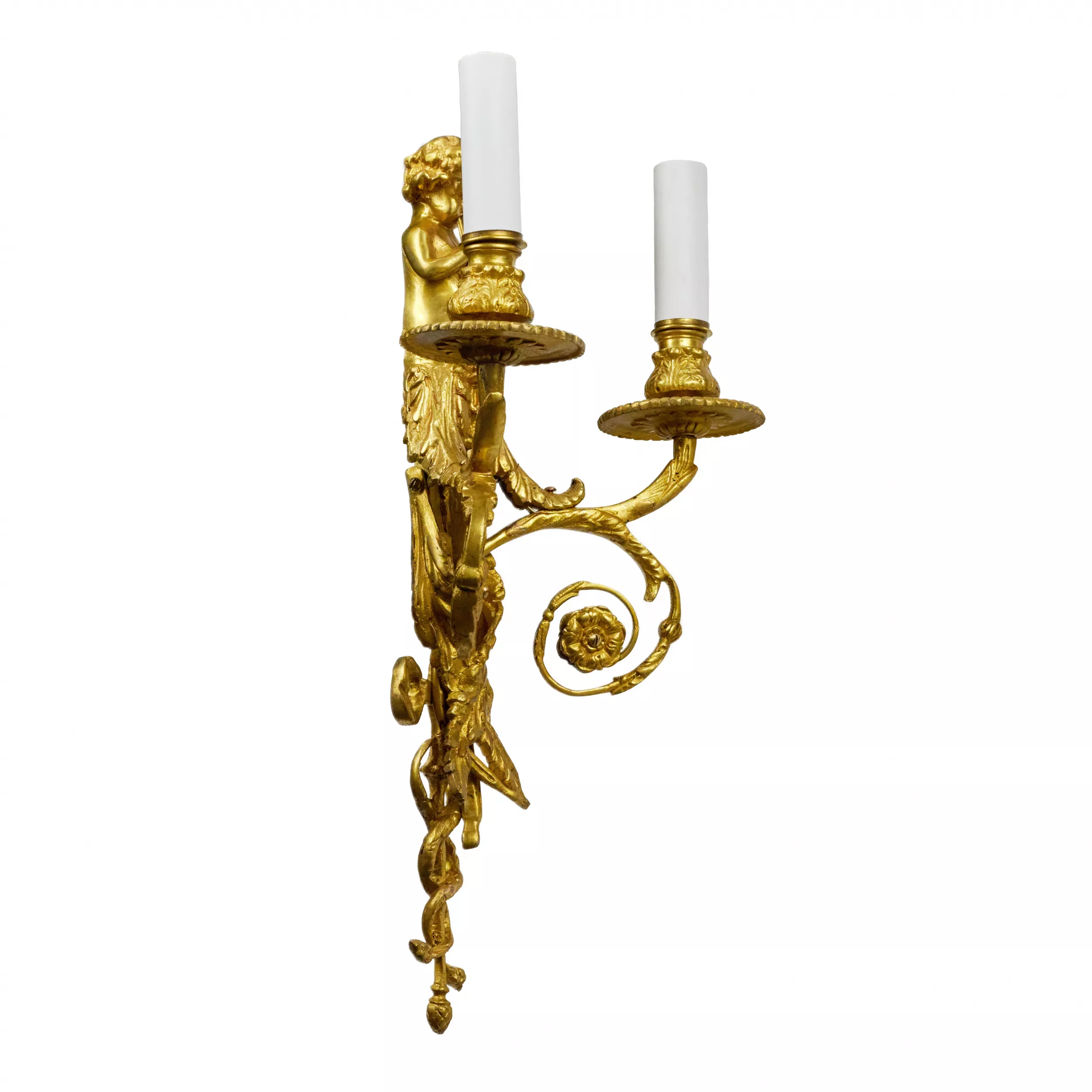 Four intricate gilded sconces with currency curls crowned with cherubs. 