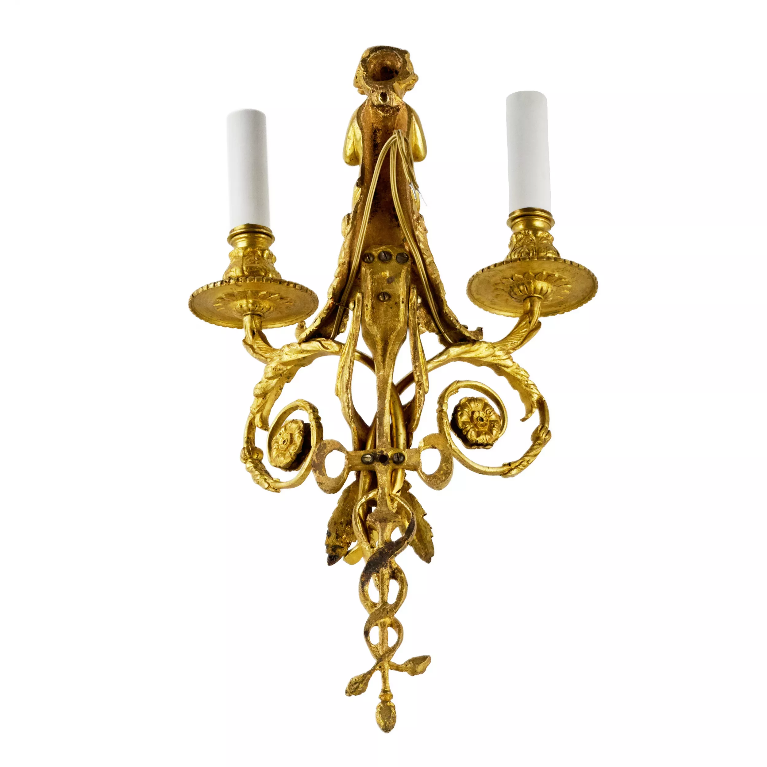 Four intricate gilded sconces with currency curls crowned with cherubs. 