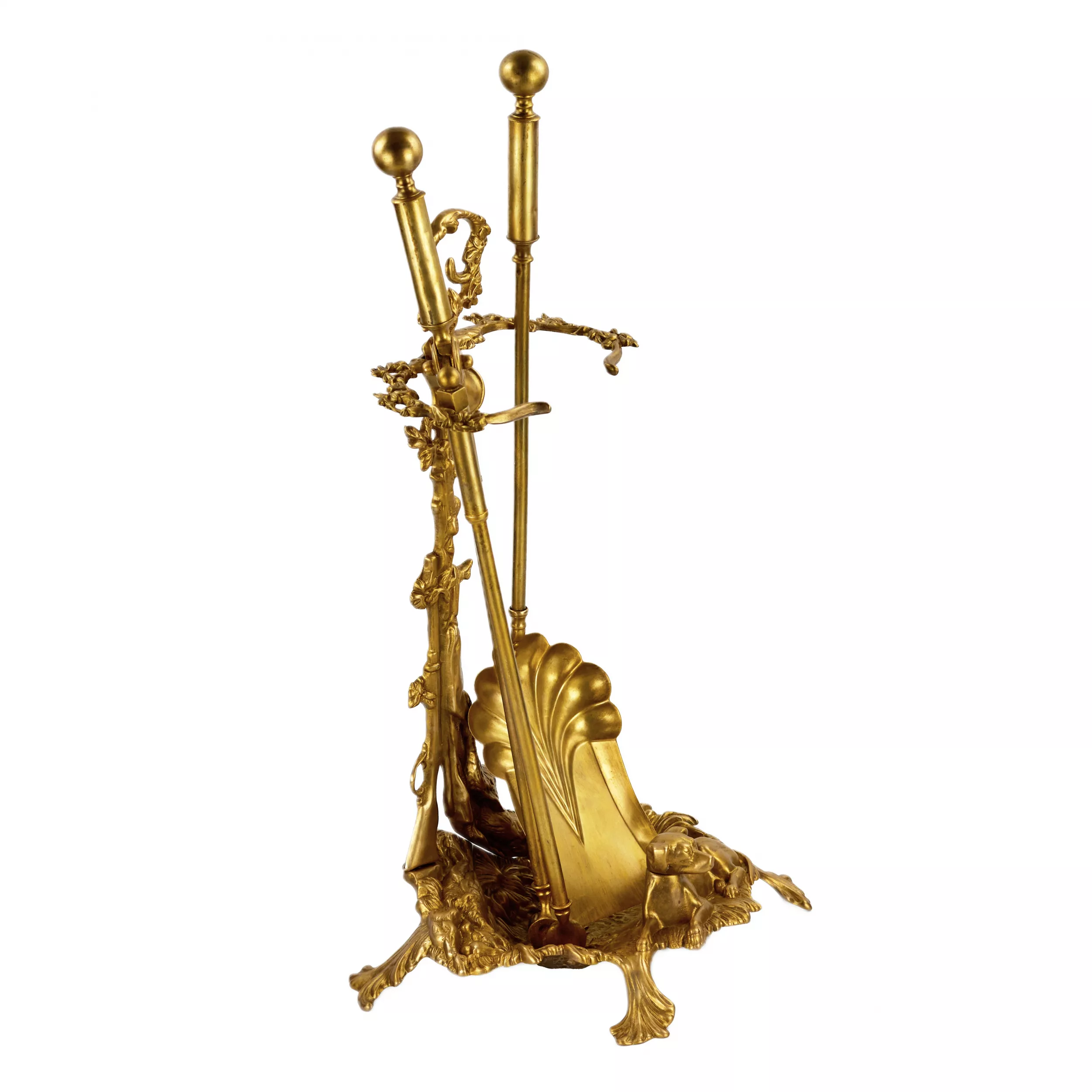 Brass set for a fireplace in the style of historicism. 19-20th centuries. 