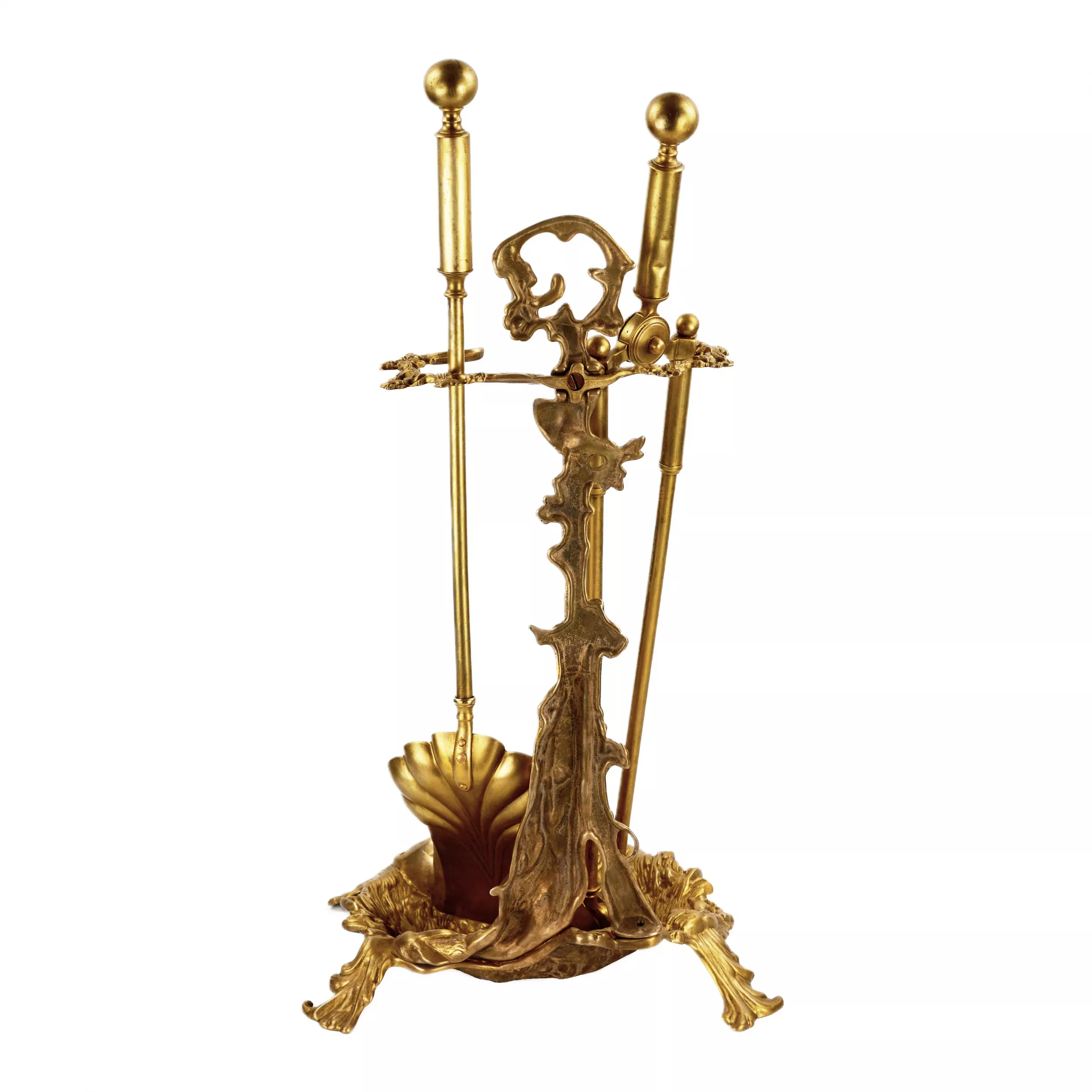 Brass set for a fireplace in the style of historicism. 19-20th centuries. 