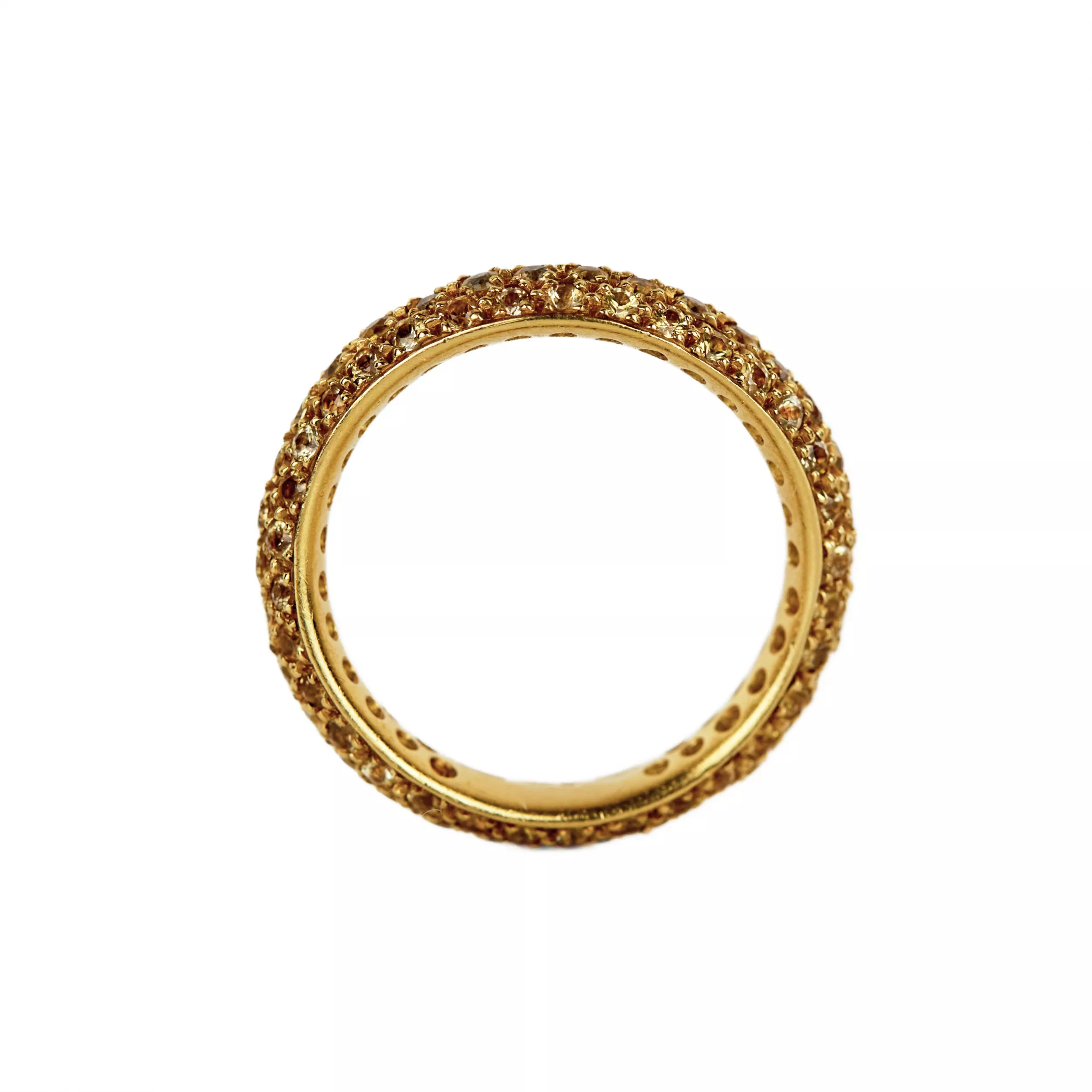 Bague en or jaune 18 K. Pomellato, avec anneau Wave en saphir jaune. 