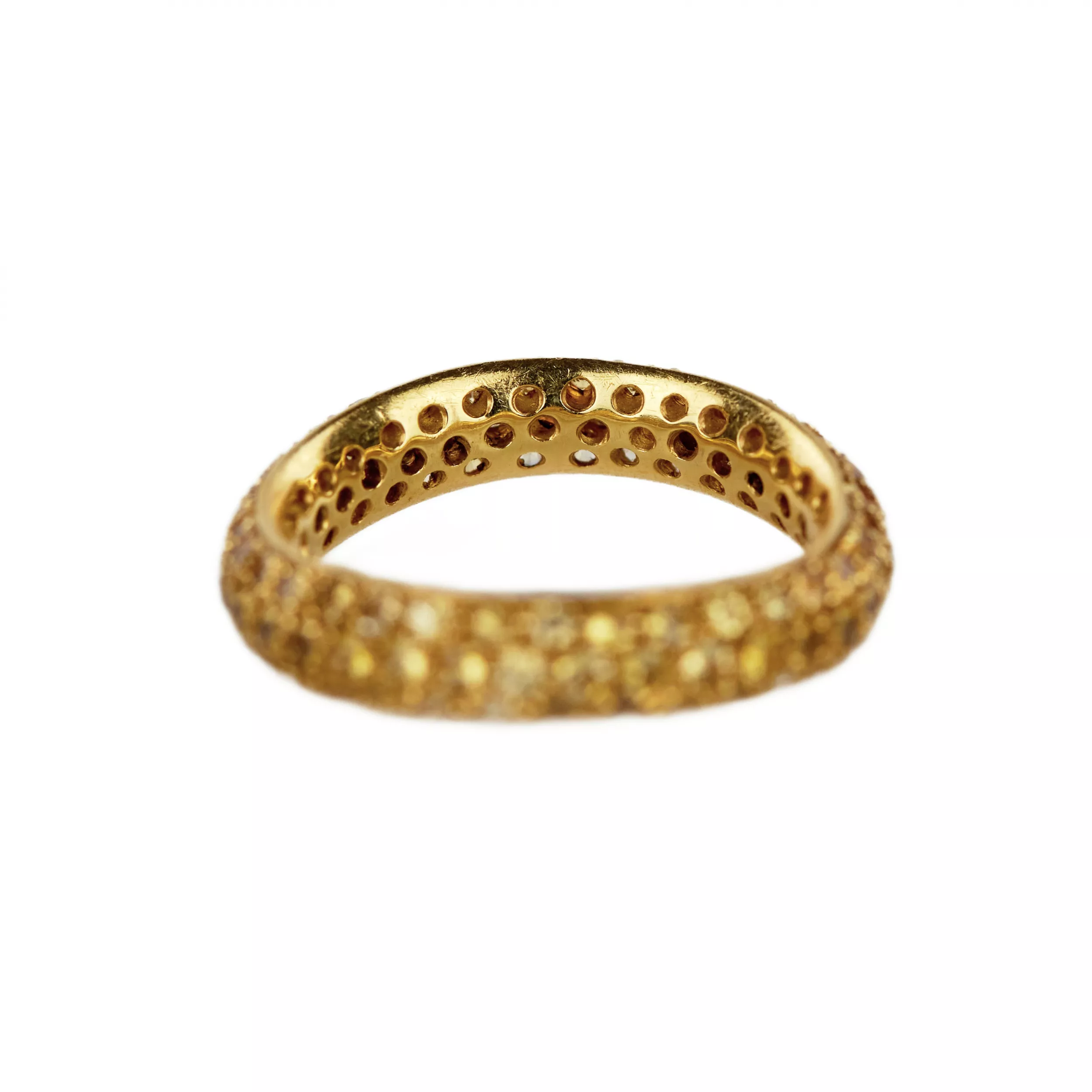 Bague en or jaune 18 K. Pomellato, avec anneau Wave en saphir jaune. 