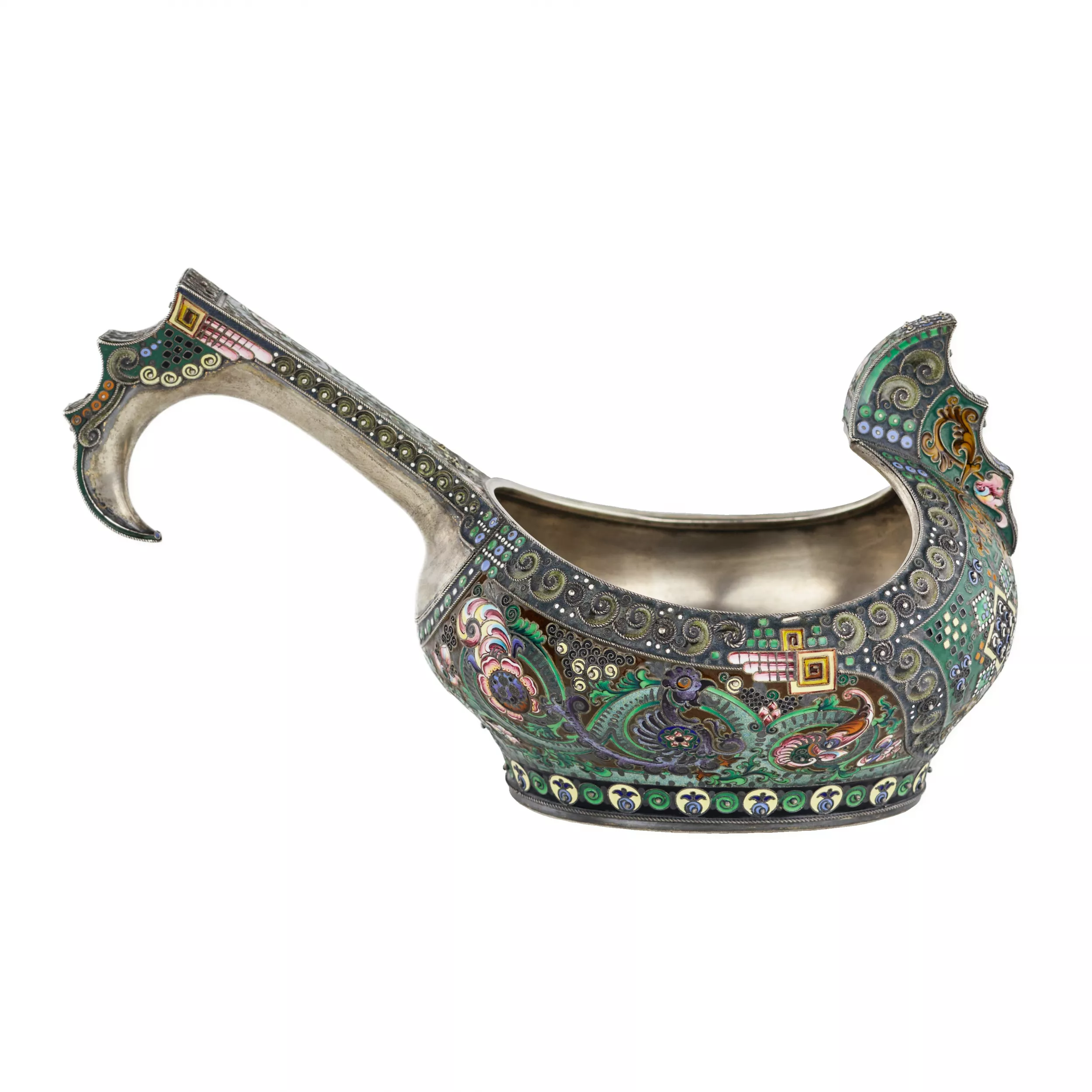 A graceful silver kovsh in the Russian Art Nouveau style of the 11th Moscow artel. Early 20th century.