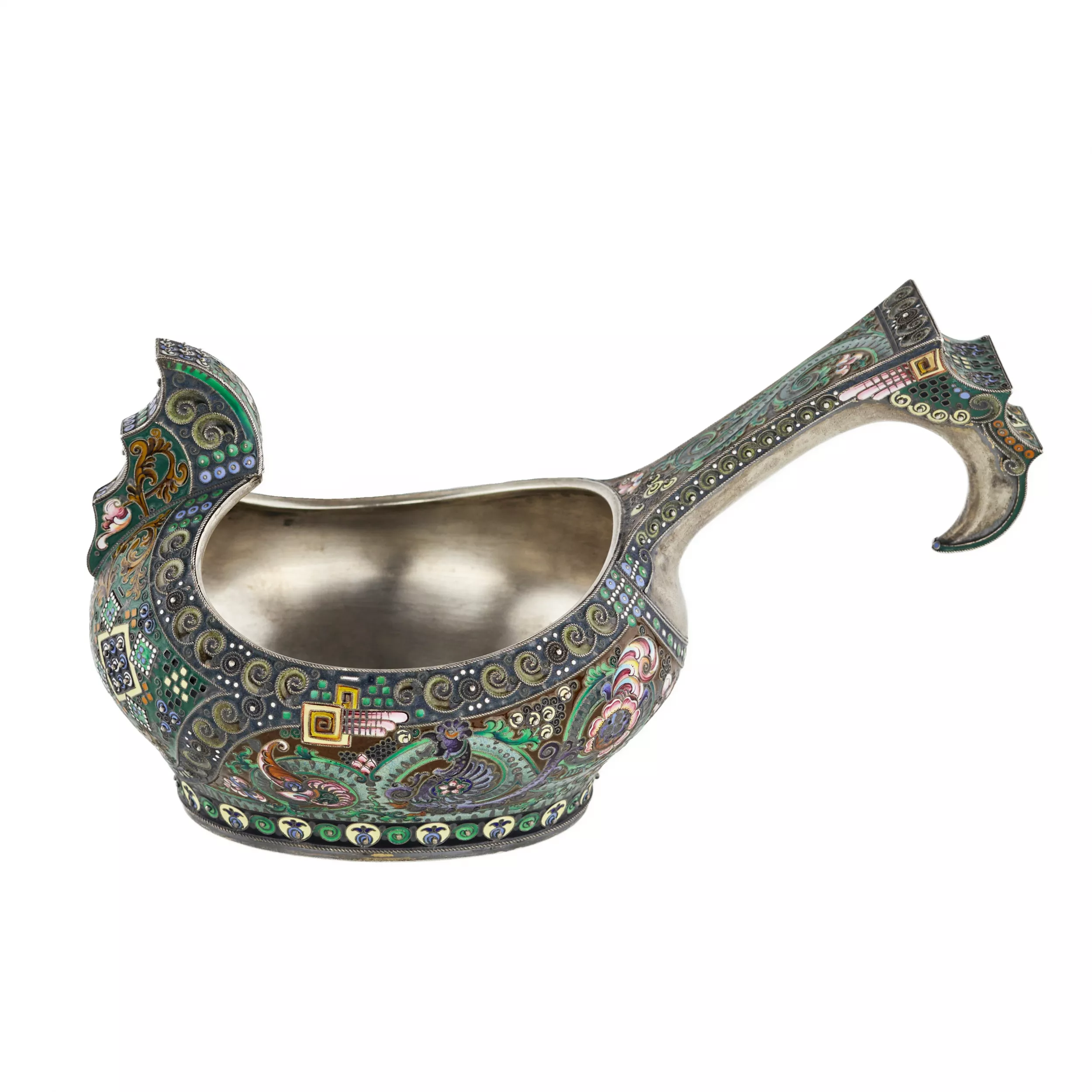 A graceful silver kovsh in the Russian Art Nouveau style of the 11th Moscow artel. Early 20th century.