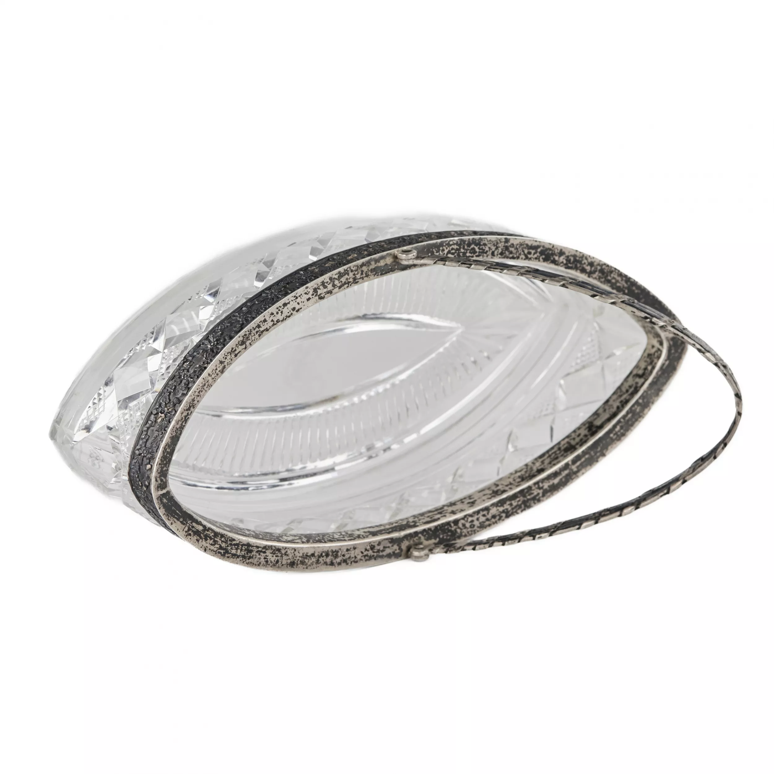 LARGE RUSSIAN SILVER-MOUNTED CRYSTAL BONBONNIÈRE IN THE FORM OF A BOAT. 15TH MOSCOW JEWELLERS` ARTEL. MOSCOW, 1908–1917
