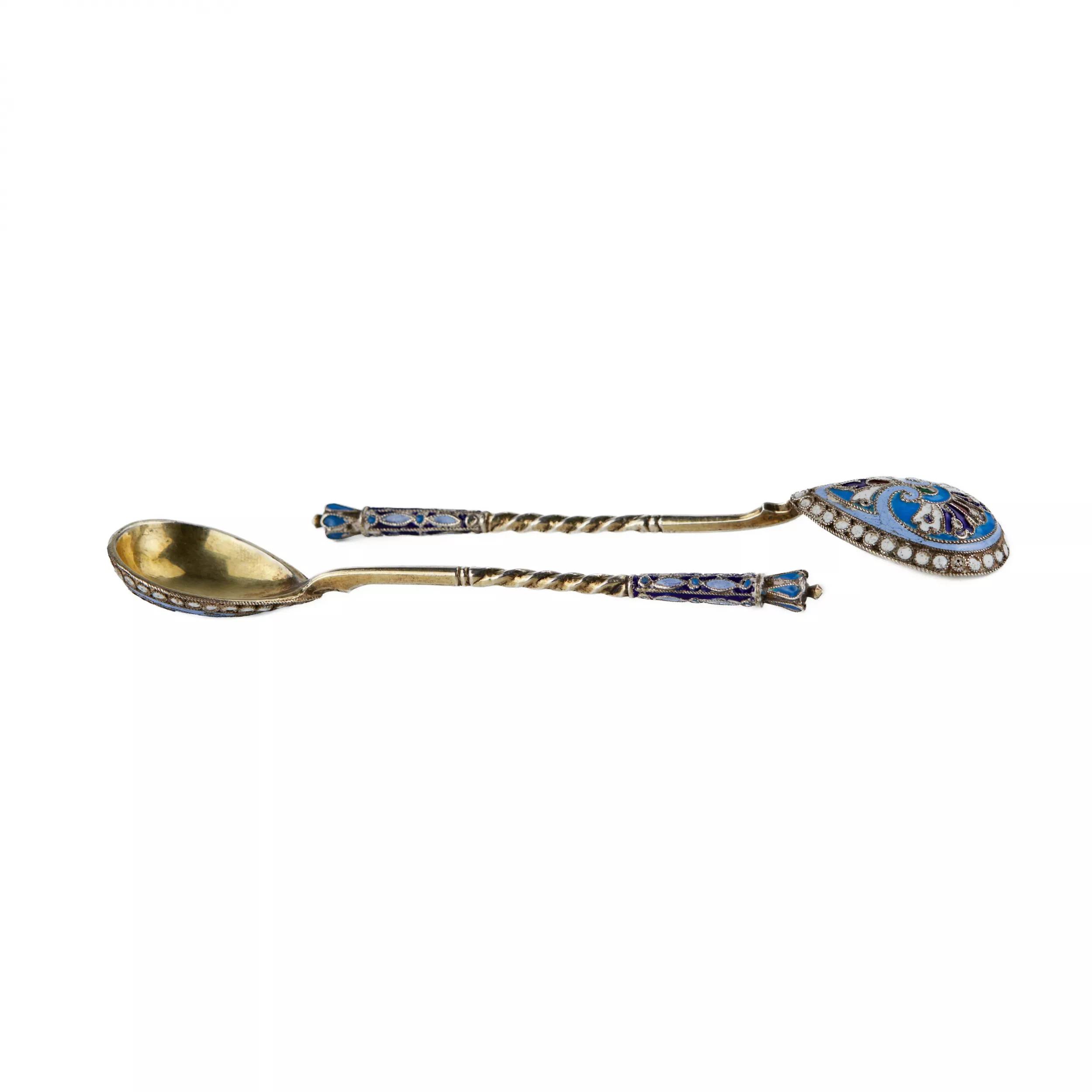 A pair of Russian silver spoons with enamel and gilding. The turn of the 19th-20th centuries.