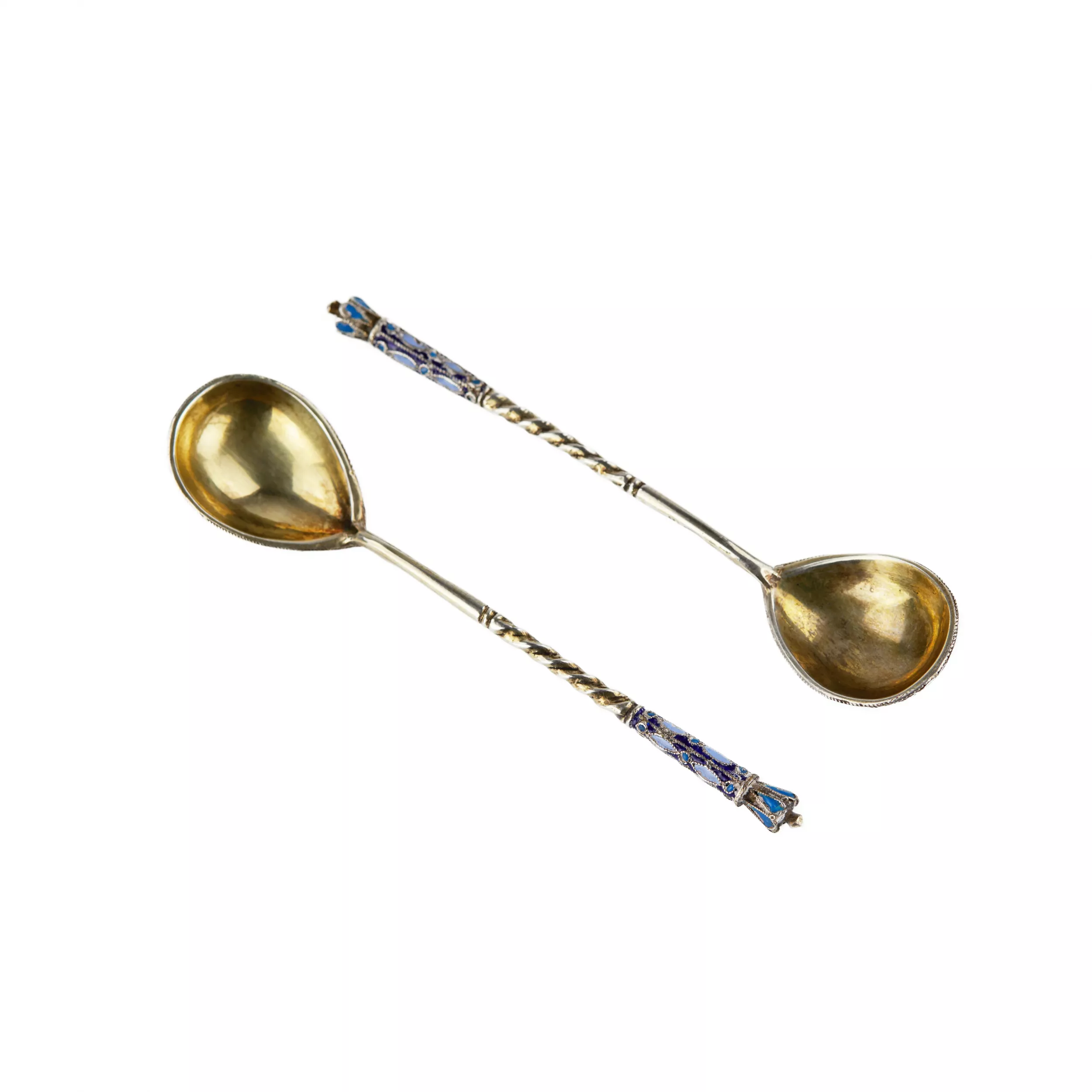 A pair of Russian silver spoons with enamel and gilding. The turn of the 19th-20th centuries.