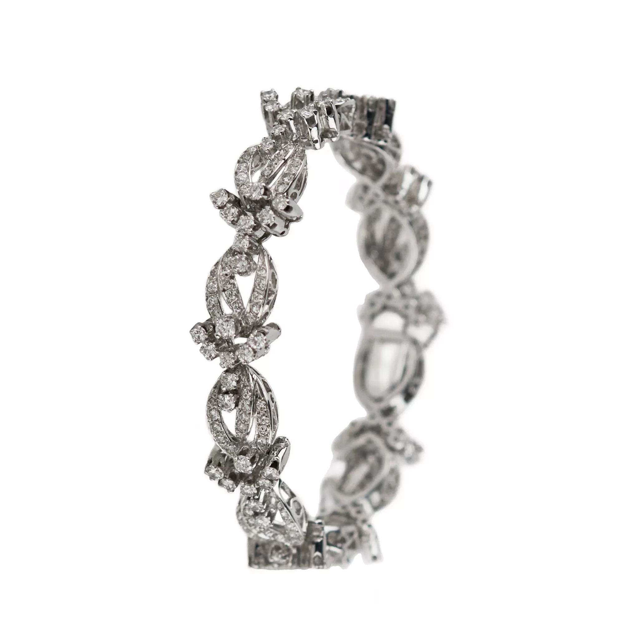 BRACELET IN 18 KARAT WHITE GOLD WITH DIAMOND FLORAL LINKS. 21ST CENTURY