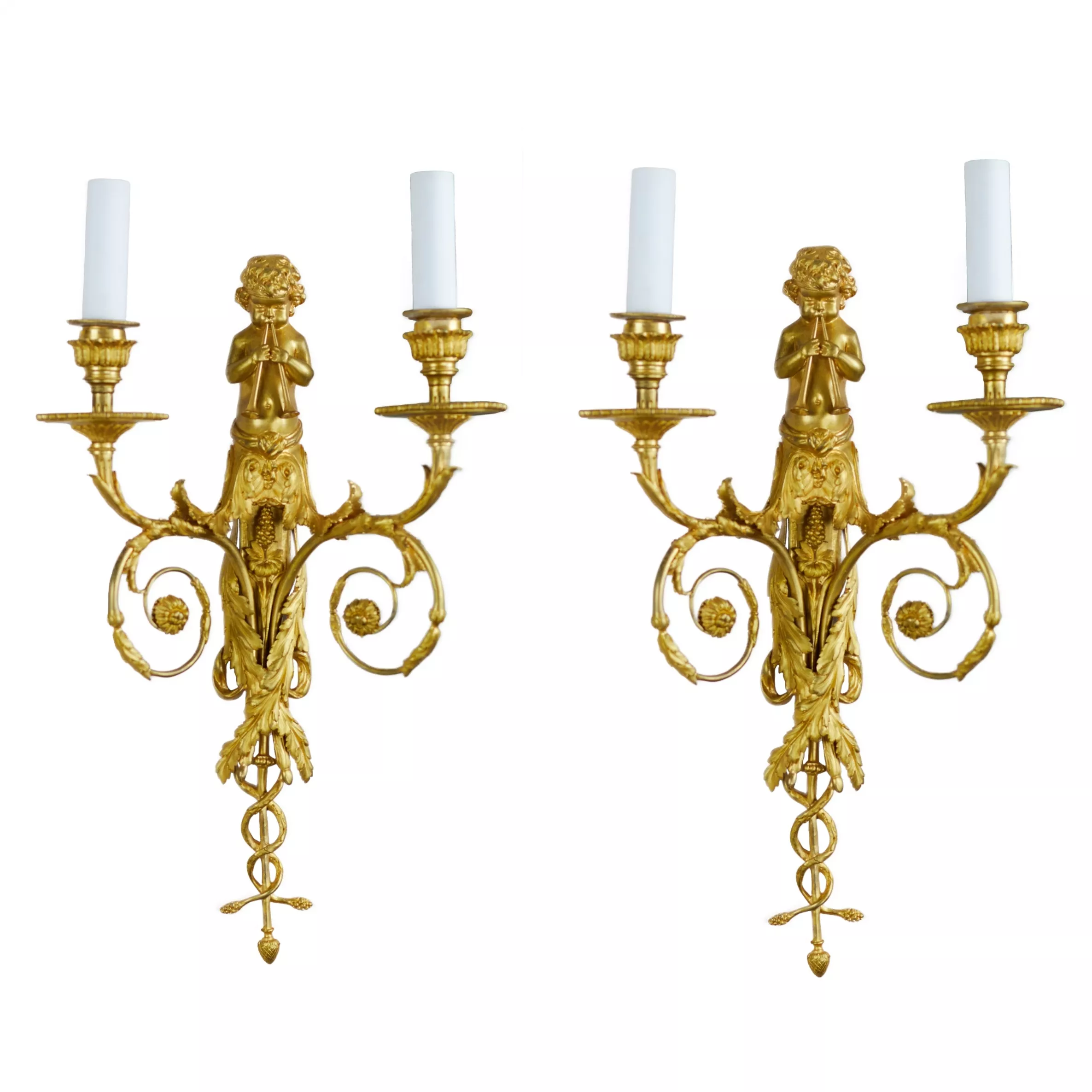 A PAIR OF FRENCH GILT-BRONZE TWO-LIGHT WALL APPLIQUES IN THE LOUIS XVI STYLE. AFTER A MODEL BY JEAN HAURÉ. FRANCE, SECOND HALF OF THE 19TH CENTURY