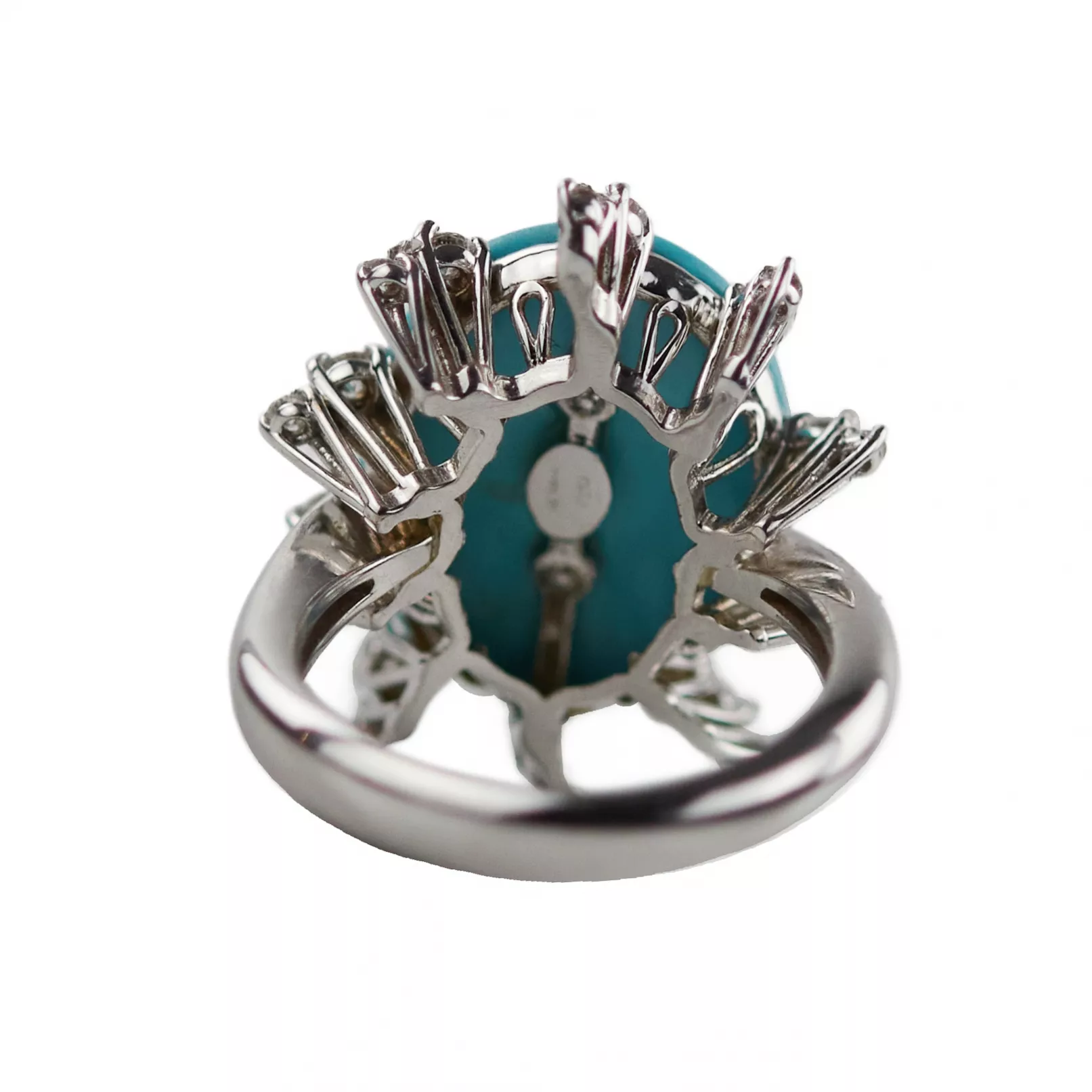 Bague en or 750, fabrication napolitaine avec turquoise et diamants. 