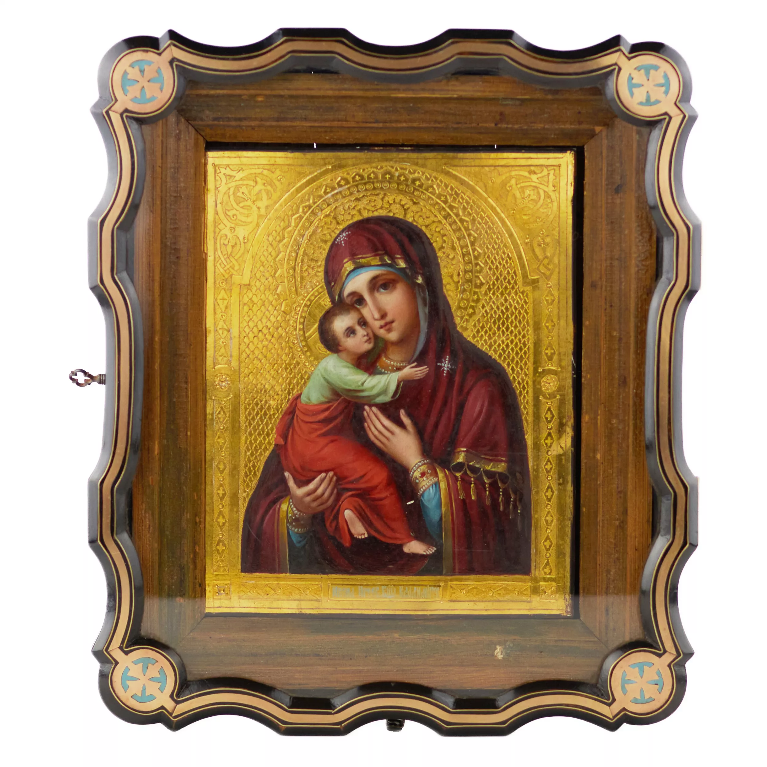 Icône de Notre-Dame de Vladimir au tournant des XIXe-XXe siècles dans un écrin à icônes. 