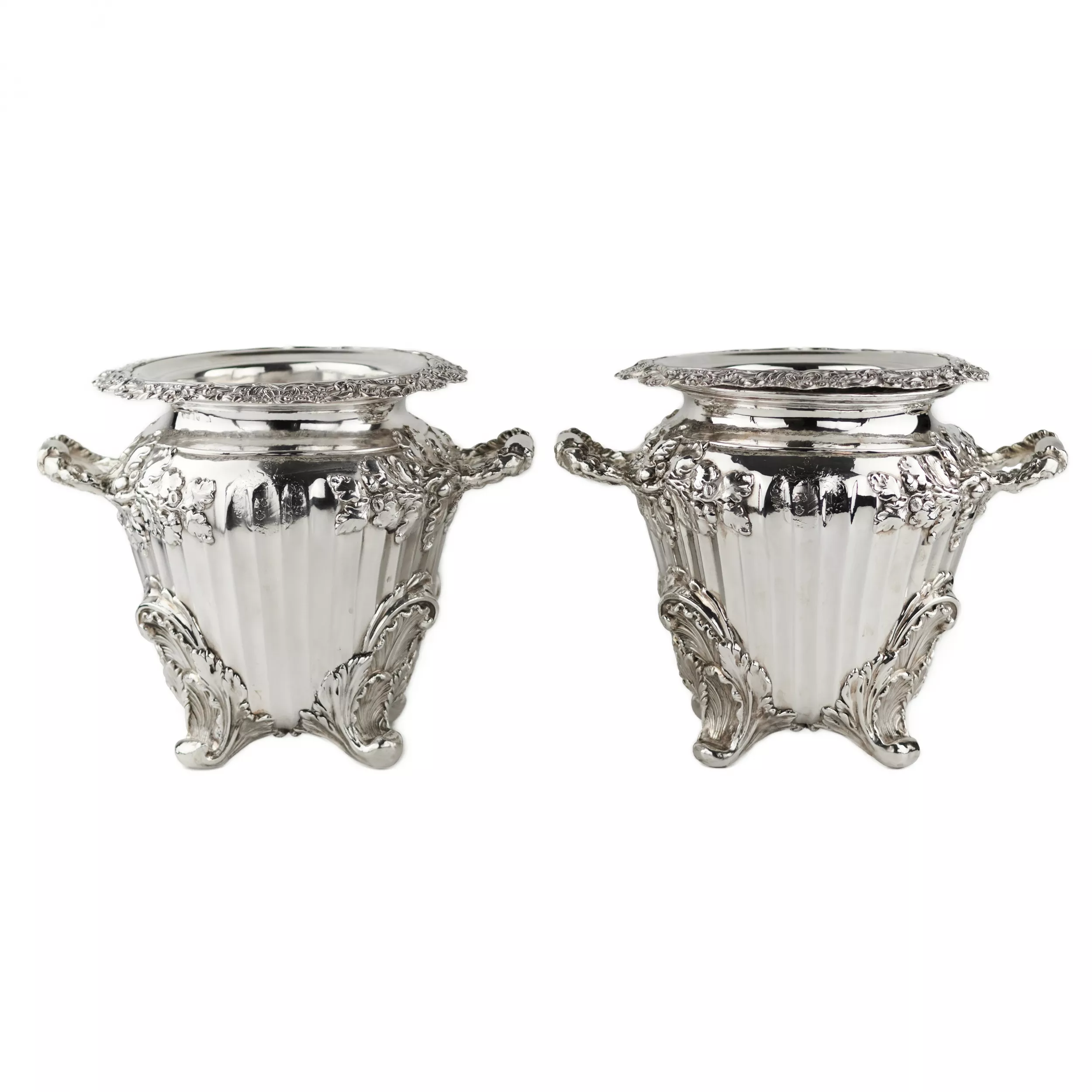 Pair of large, embossed silver wine coolers. England. 1804 Stephen Adams. 