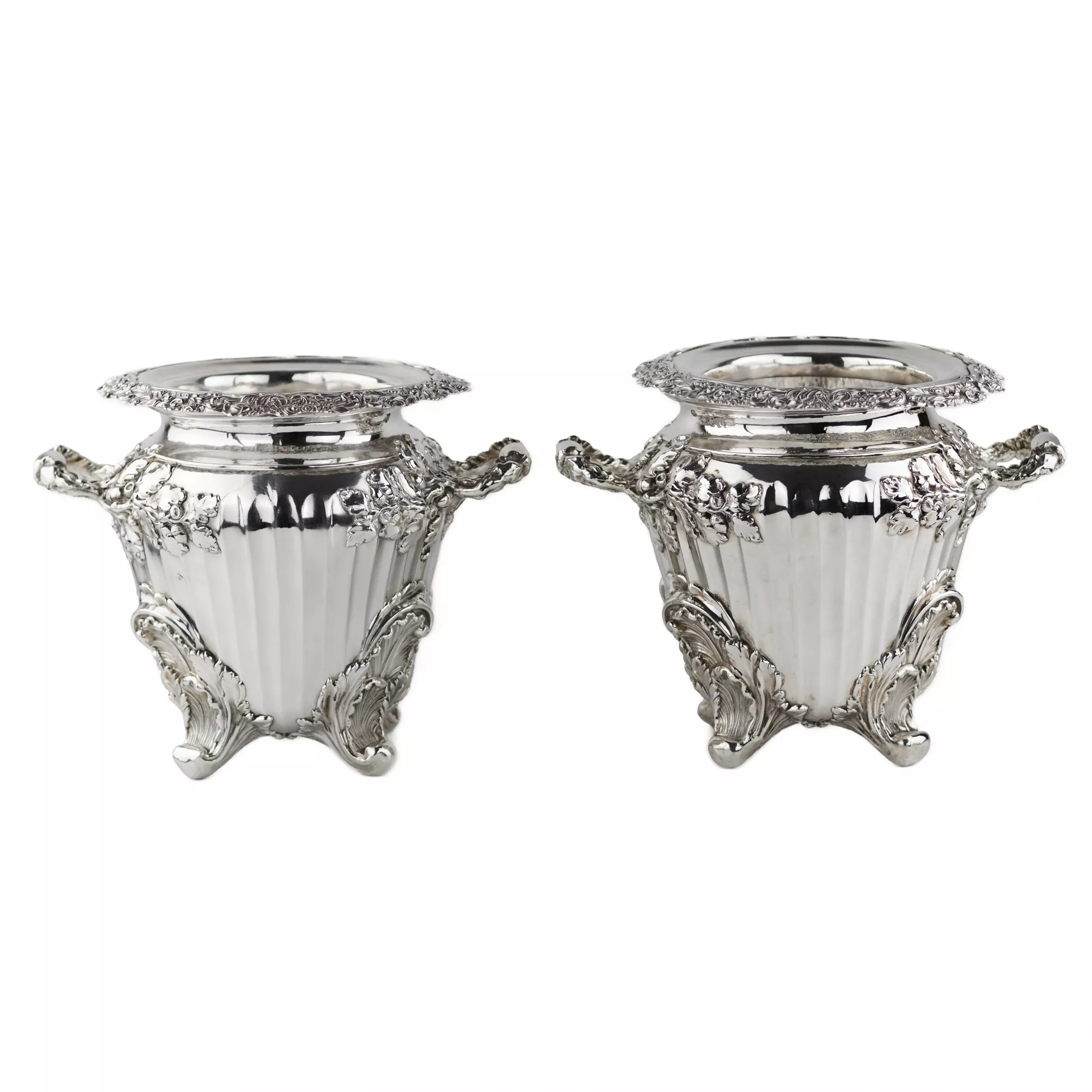 Pair of large, embossed silver wine coolers. England. 1804 Stephen Adams. 