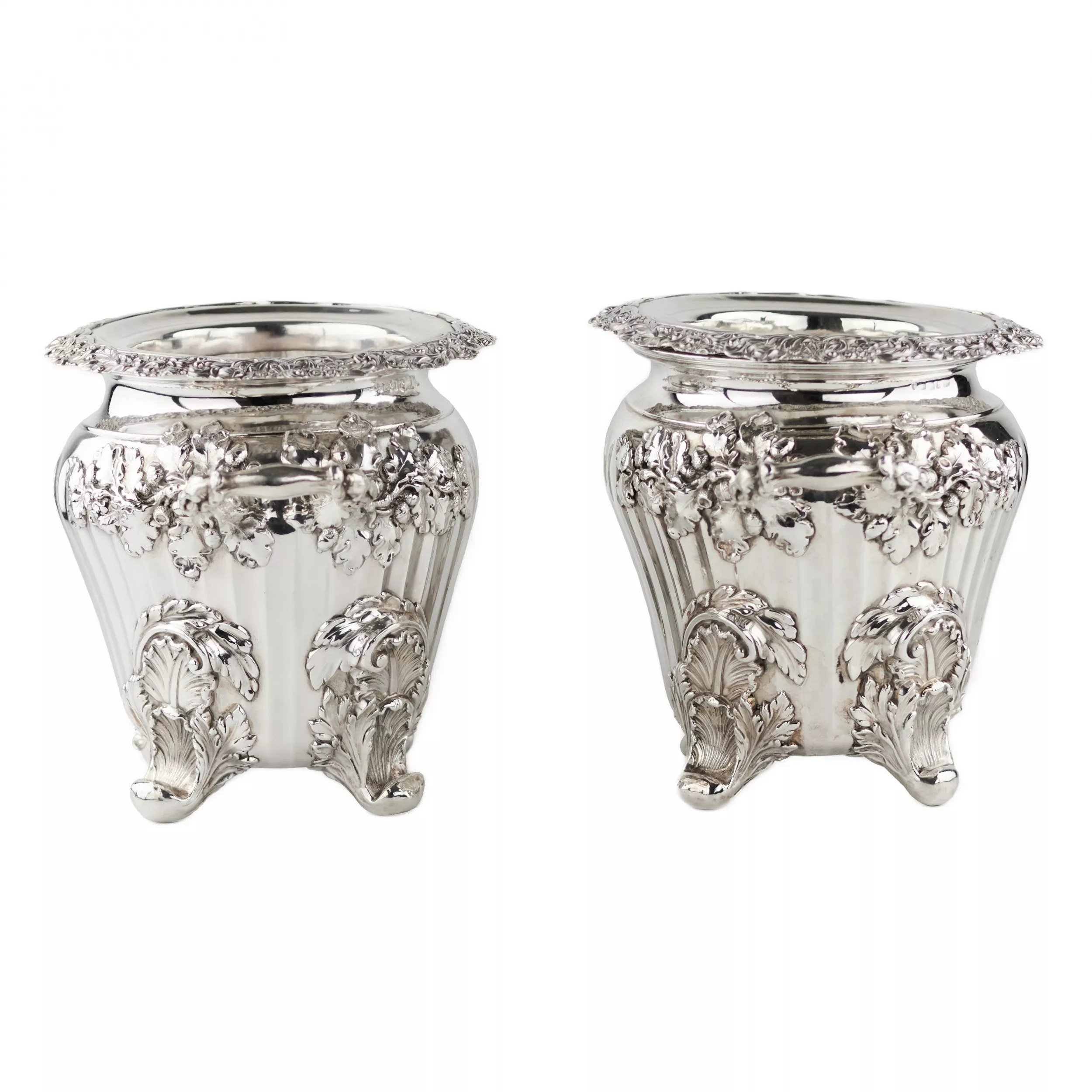 Pair of large, embossed silver wine coolers. England. 1804 Stephen Adams. 