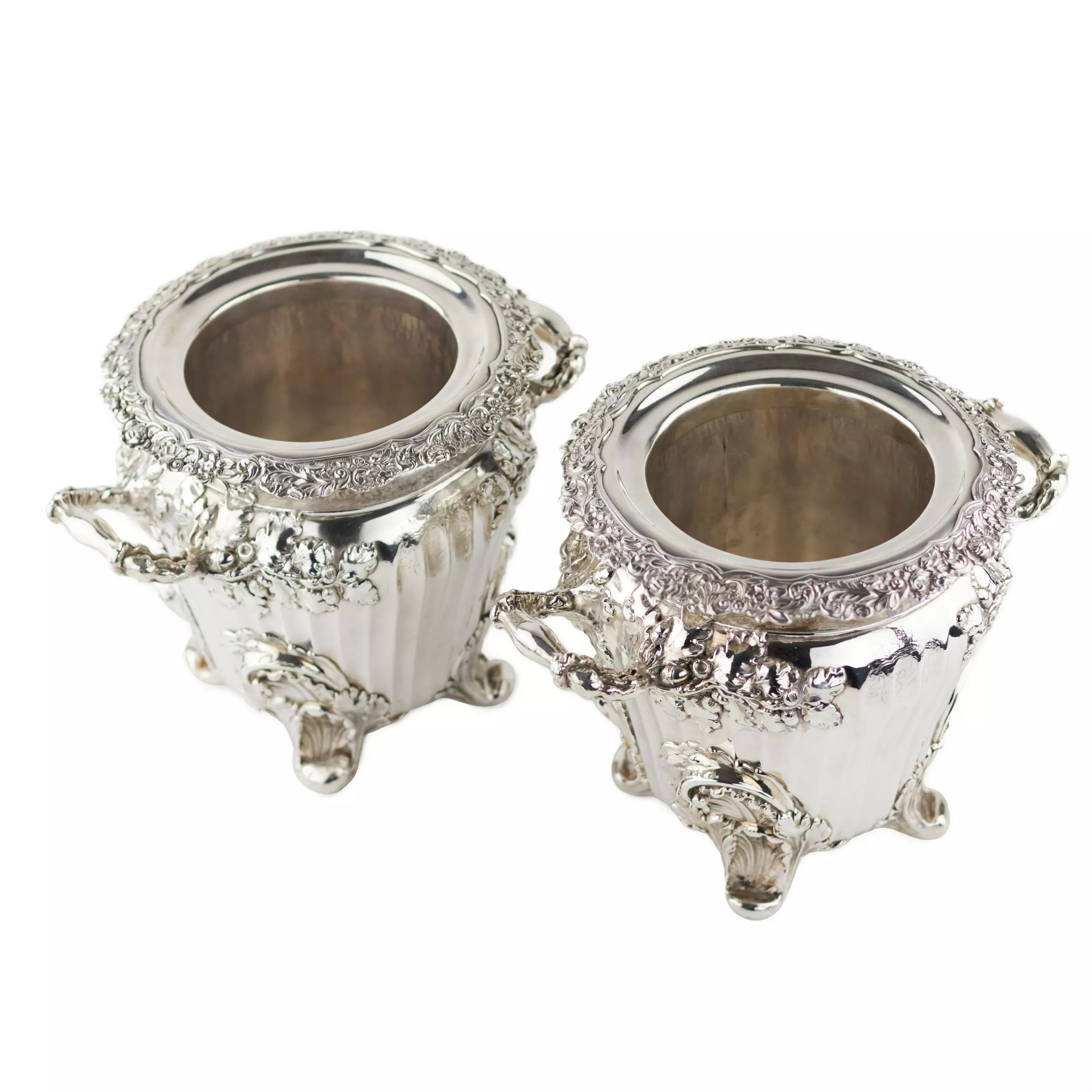 Pair of large, embossed silver wine coolers. England. 1804 Stephen Adams. 