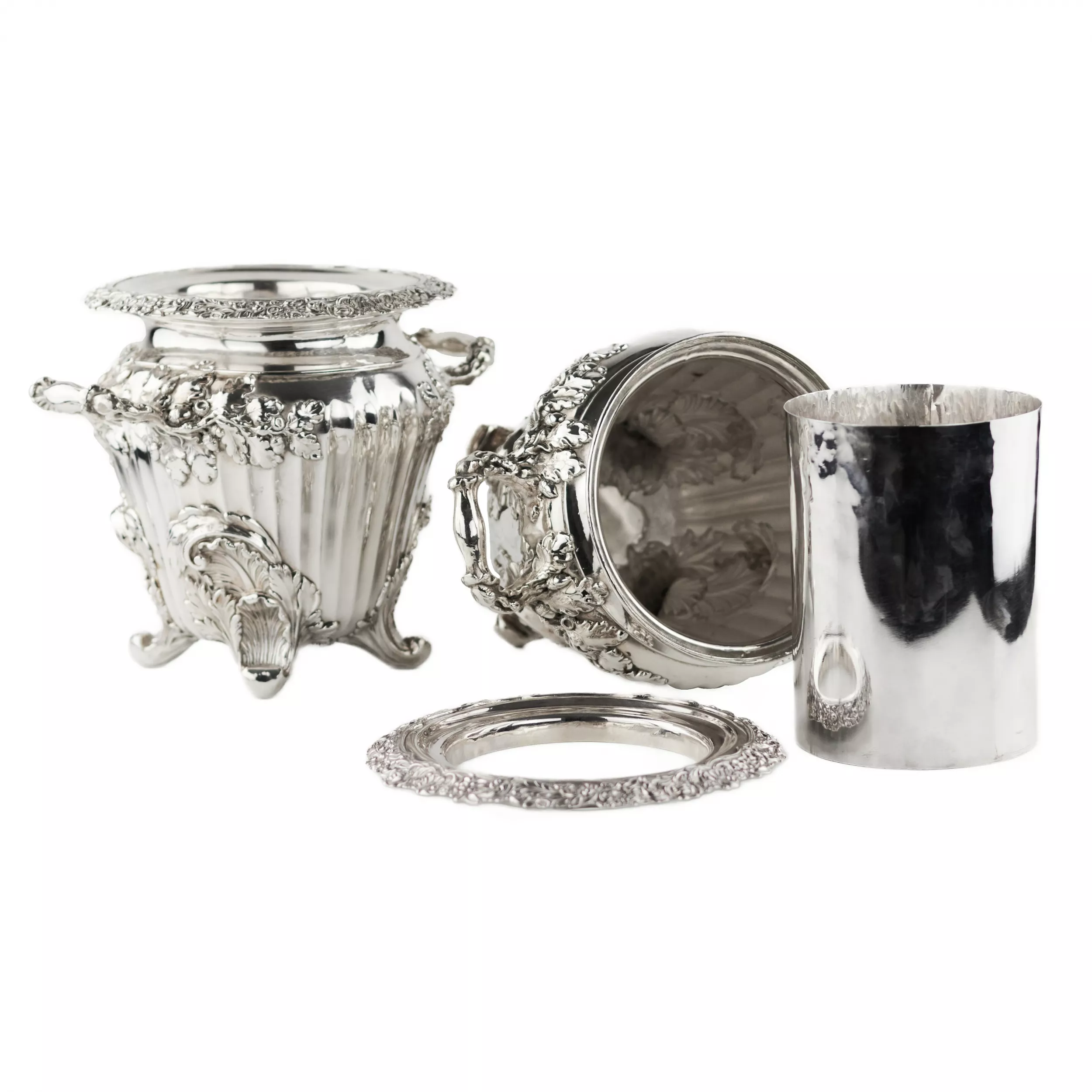 Pair of large, embossed silver wine coolers. England. 1804 Stephen Adams. 