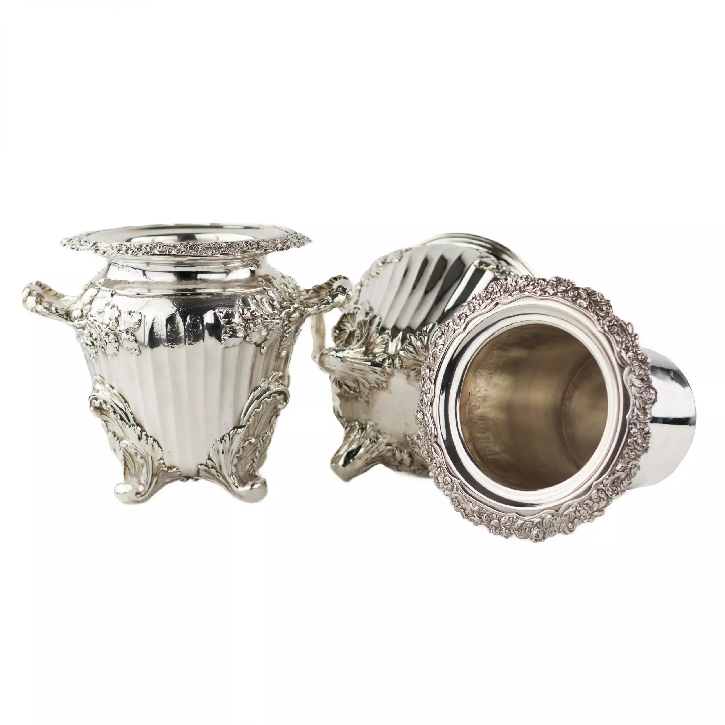 Pair of large, embossed silver wine coolers. England. 1804 Stephen Adams. 