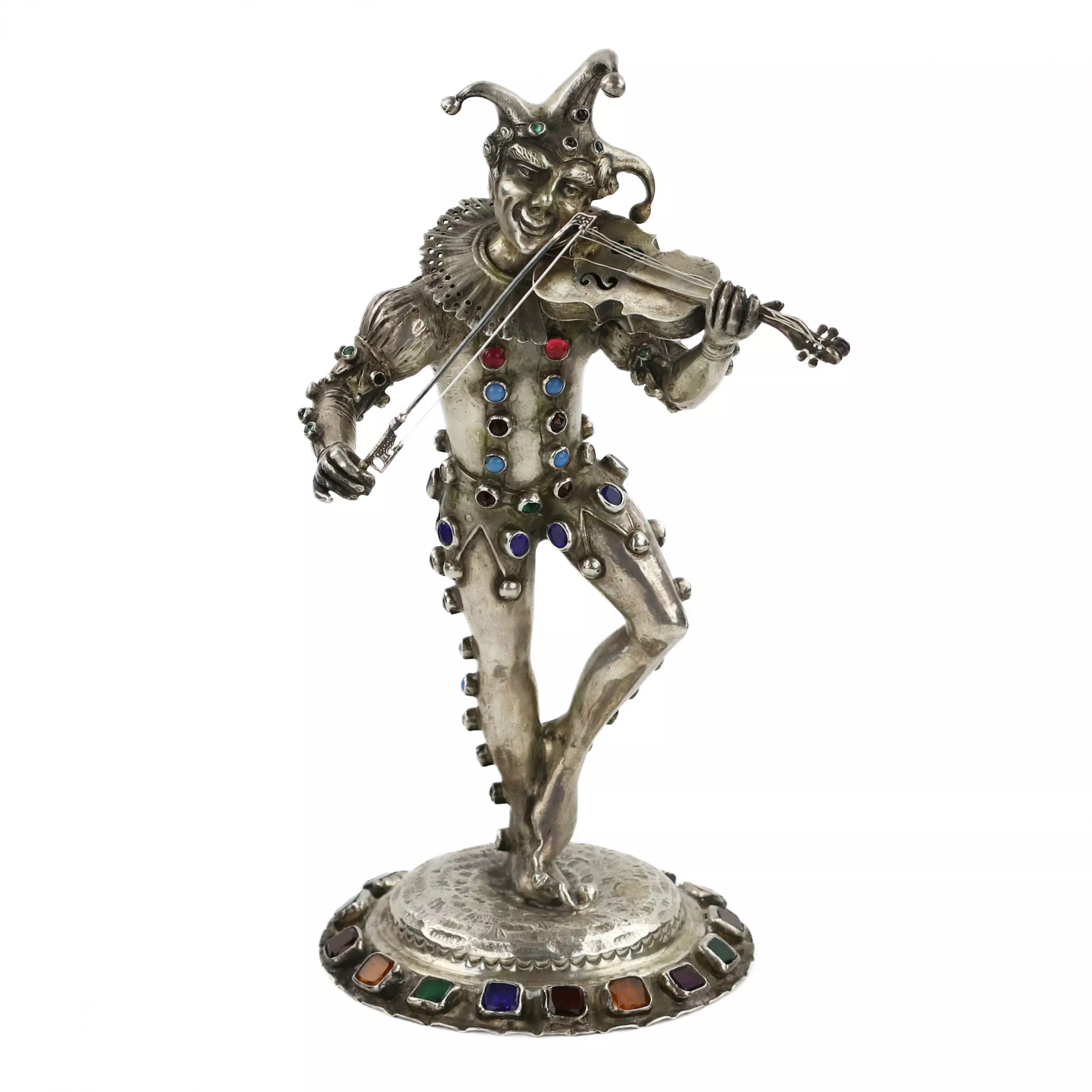 Figurine en argent d`un Arlequin jouant. Allemagne. 19ème siècle. 