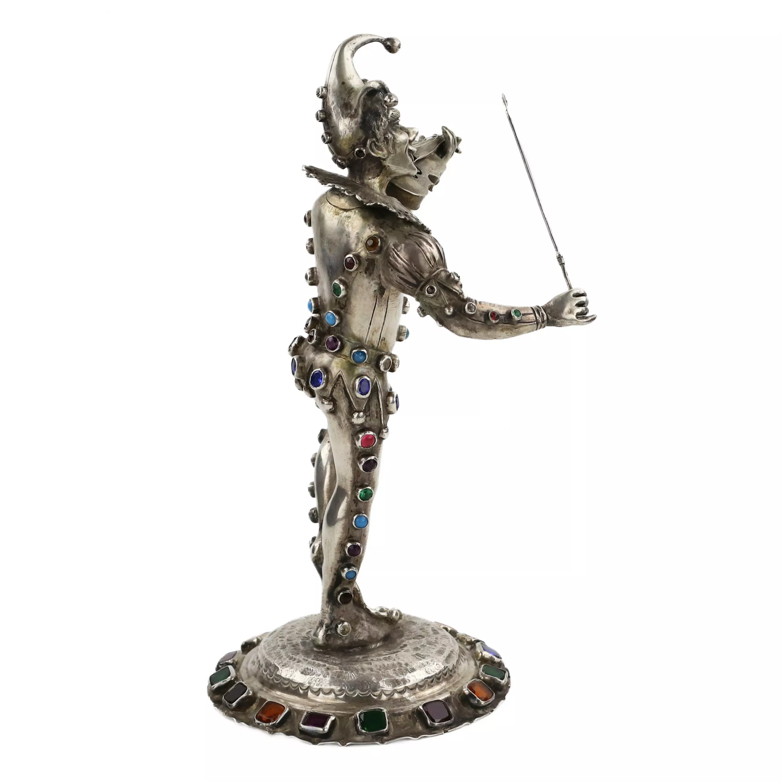 Figurine en argent d`un Arlequin jouant. Allemagne. 19ème siècle. 
