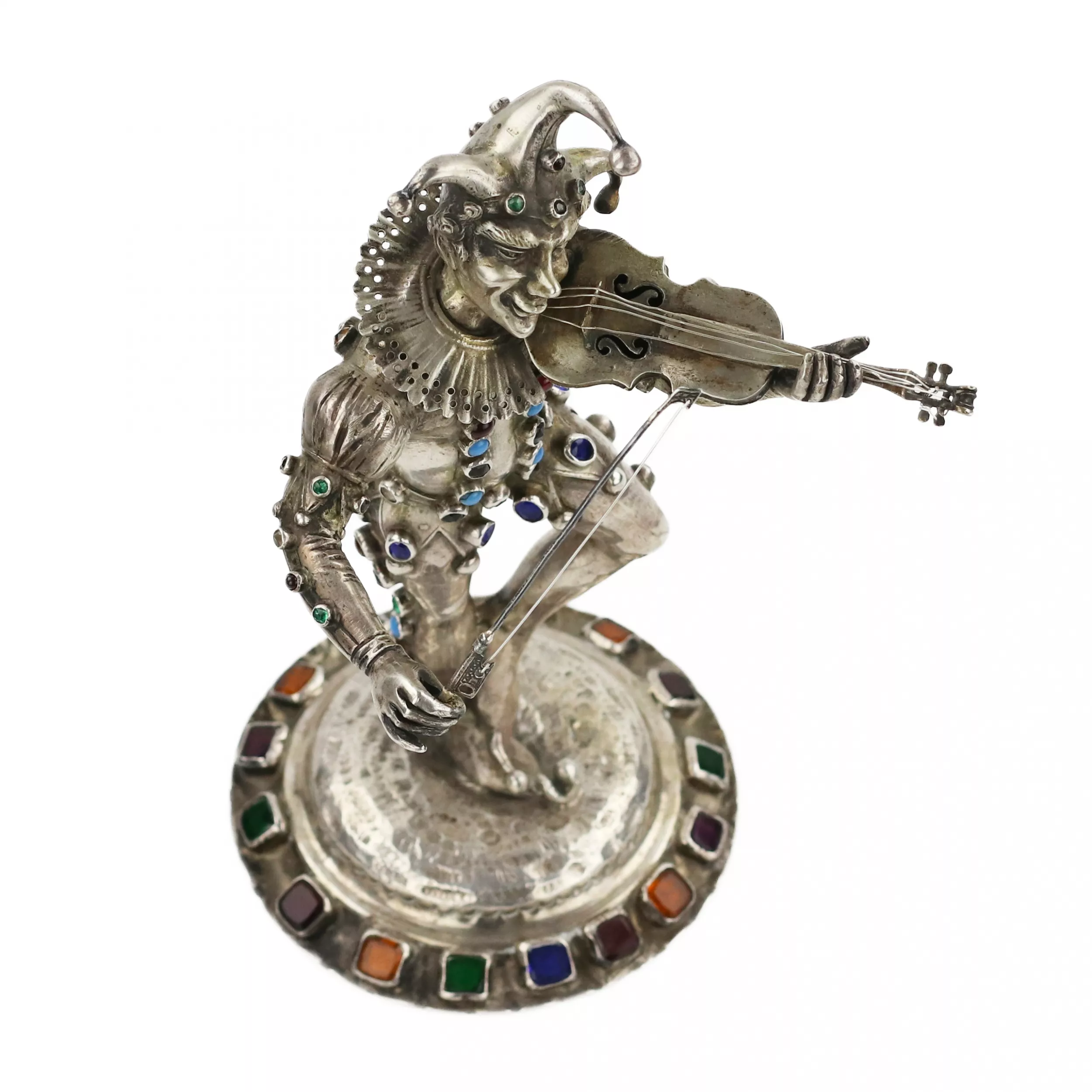Figurine en argent d`un Arlequin jouant. Allemagne. 19ème siècle. 