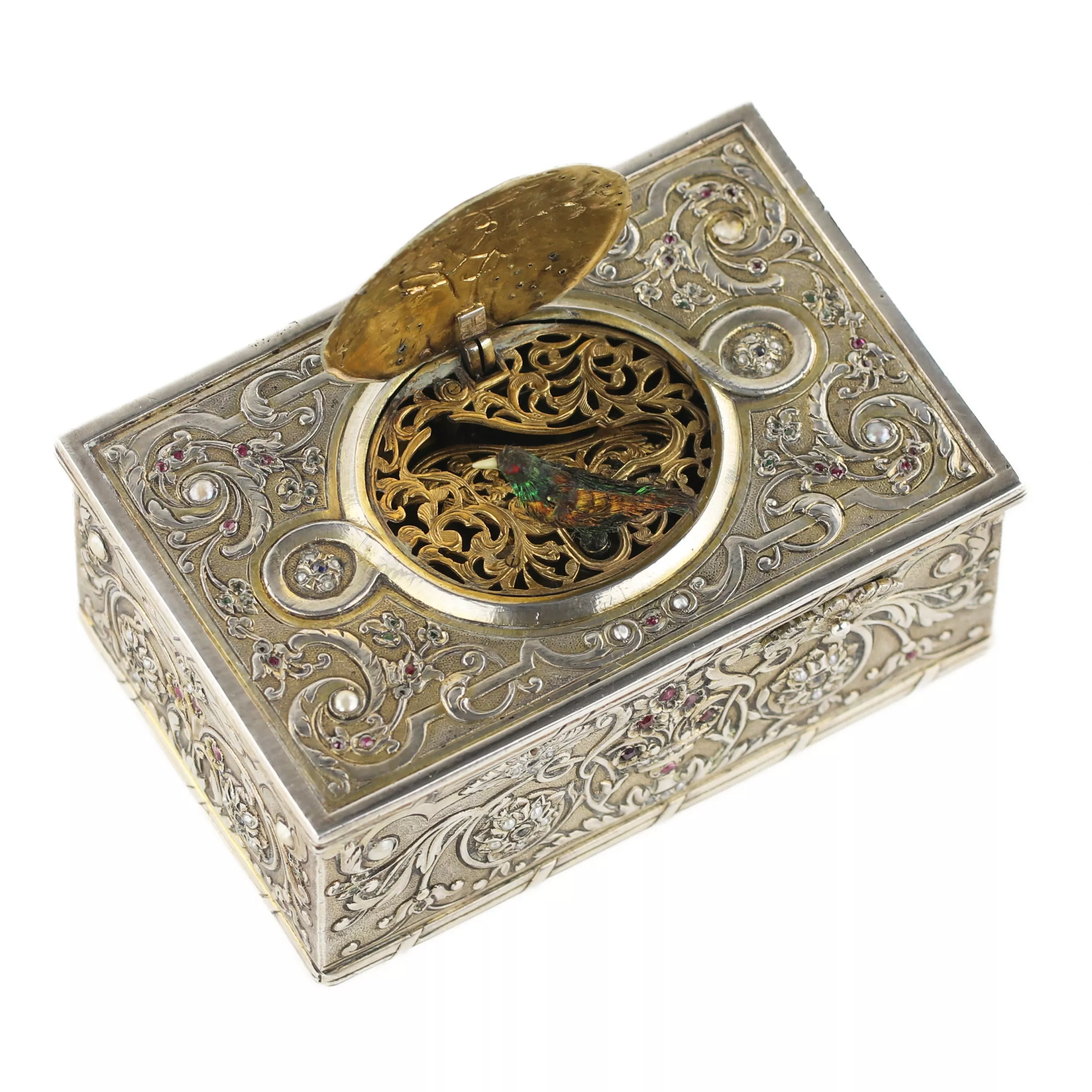 Boîte à musique en argent avec dorure et pierres représentant un oiseau chanteur. Karl Griesbaum. années 1930. 