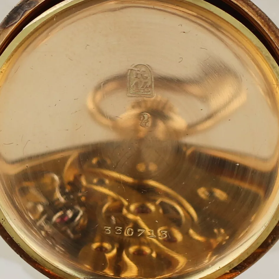 Montre de poche en or Uyisse Nardin du tournant des XIXème et XXème siècles. Dans une boîte et avec une chaîne en or. 