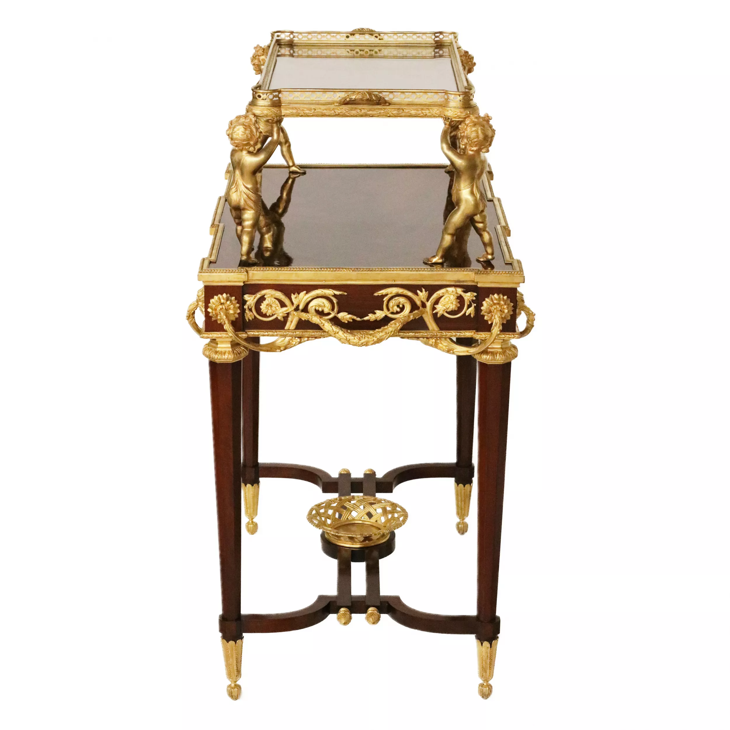 Two-tier tea table with attributes in the Louis XVI style, modeled by Francois Lincke. France, late 19th century 