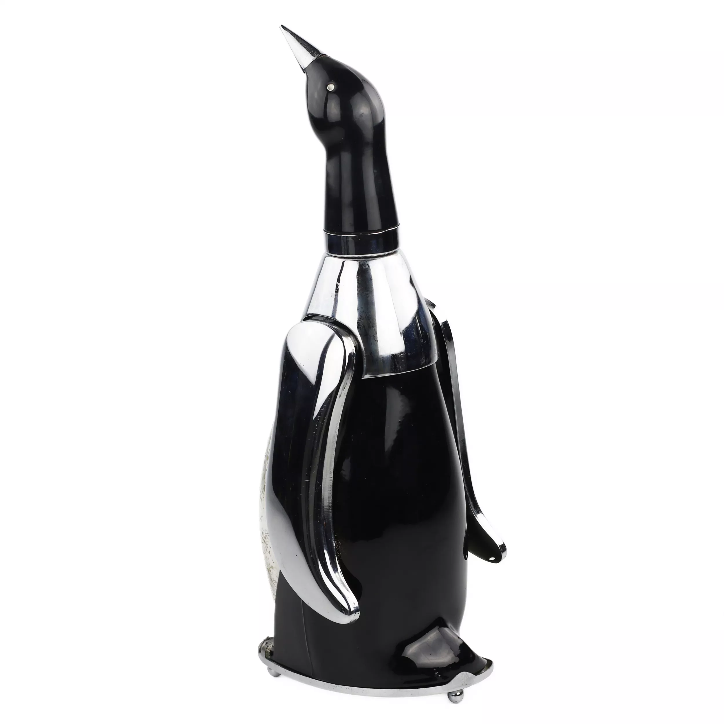 CARAFE EN FORME DE MANCHOT AVEC BOÎTE À MUSIQUE. JAPON. ANNÉES 1960