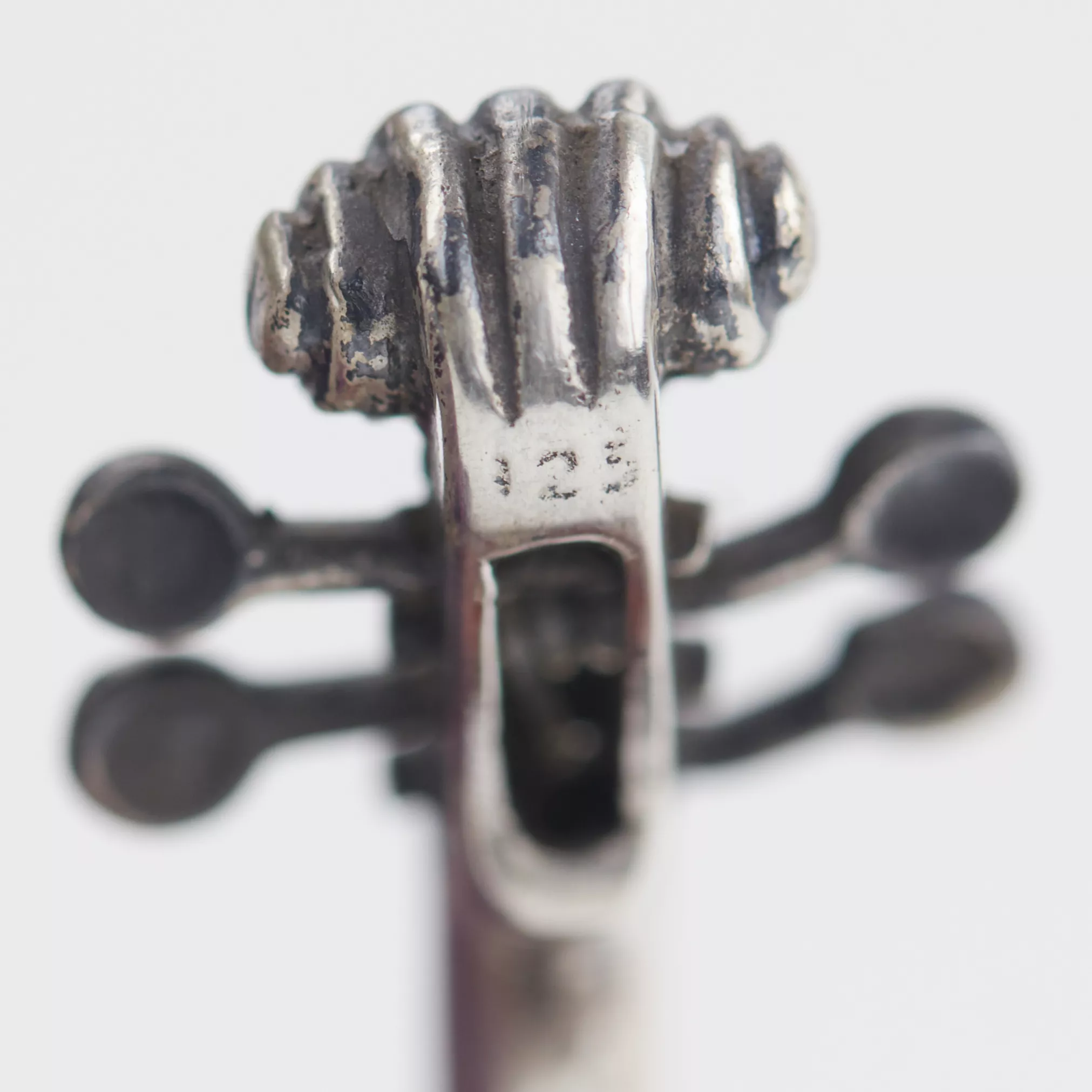 A MINIATURE SILVER VIOLIN IN A CASE, EUROPE, EARLY 20TH CENTURY 