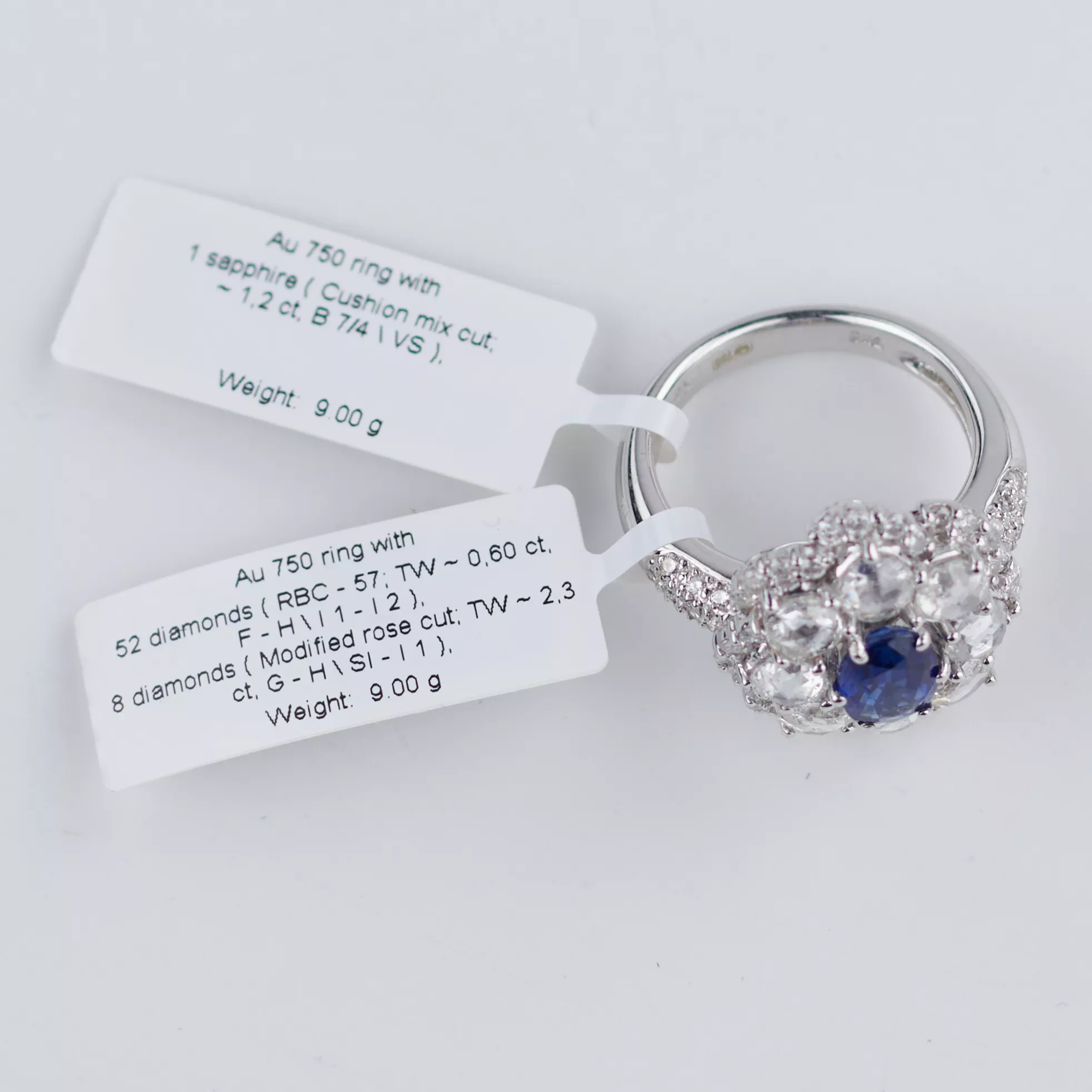 18-KARAT WHITE GOLD RING WITH SAPPHIRE AND DIAMONDS