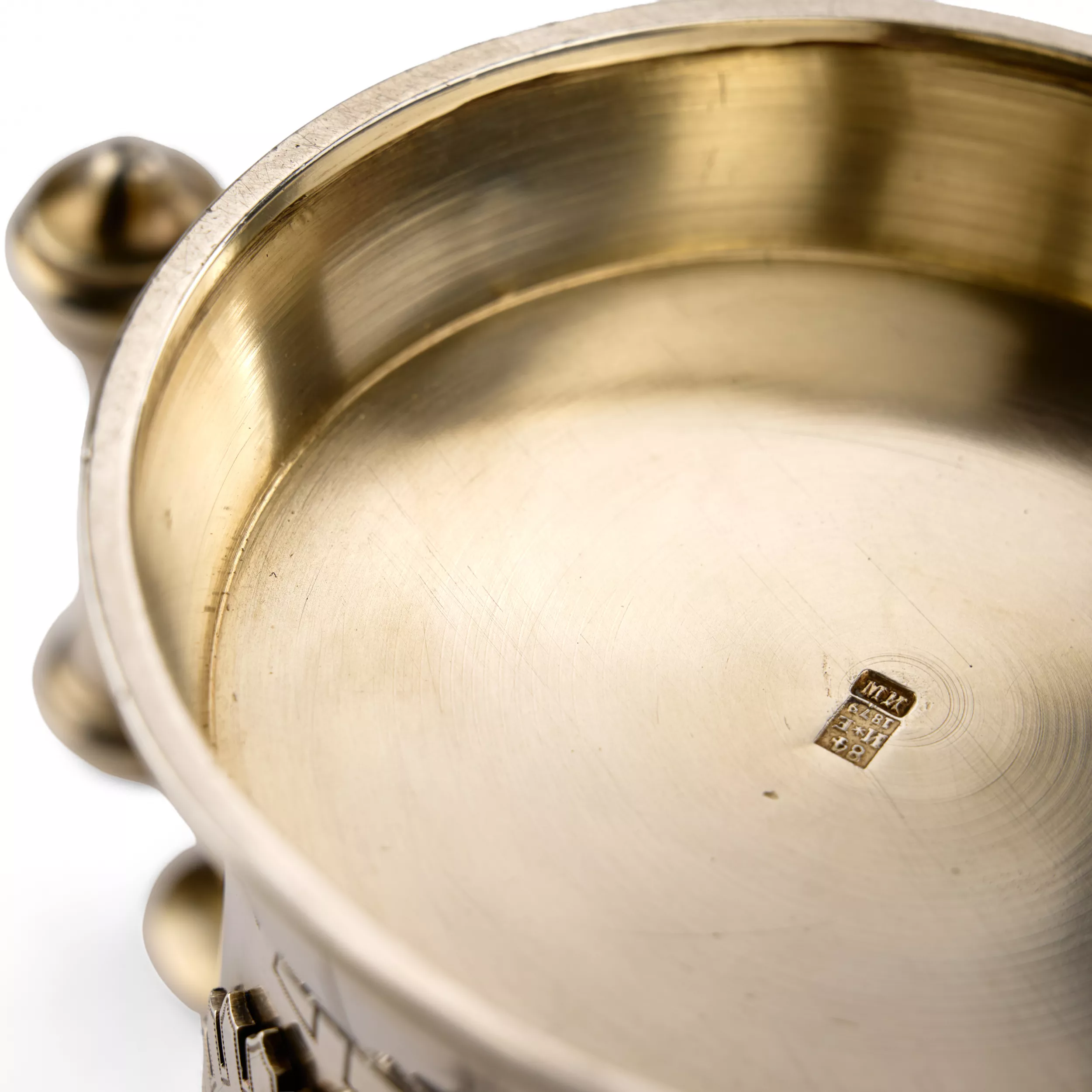 SILVER TEA GLASS HOLDER WITH RELIEF MEDALLIONS IN THE NEO-RUSSIAN STYLE. ST PETERSBURG, 1879