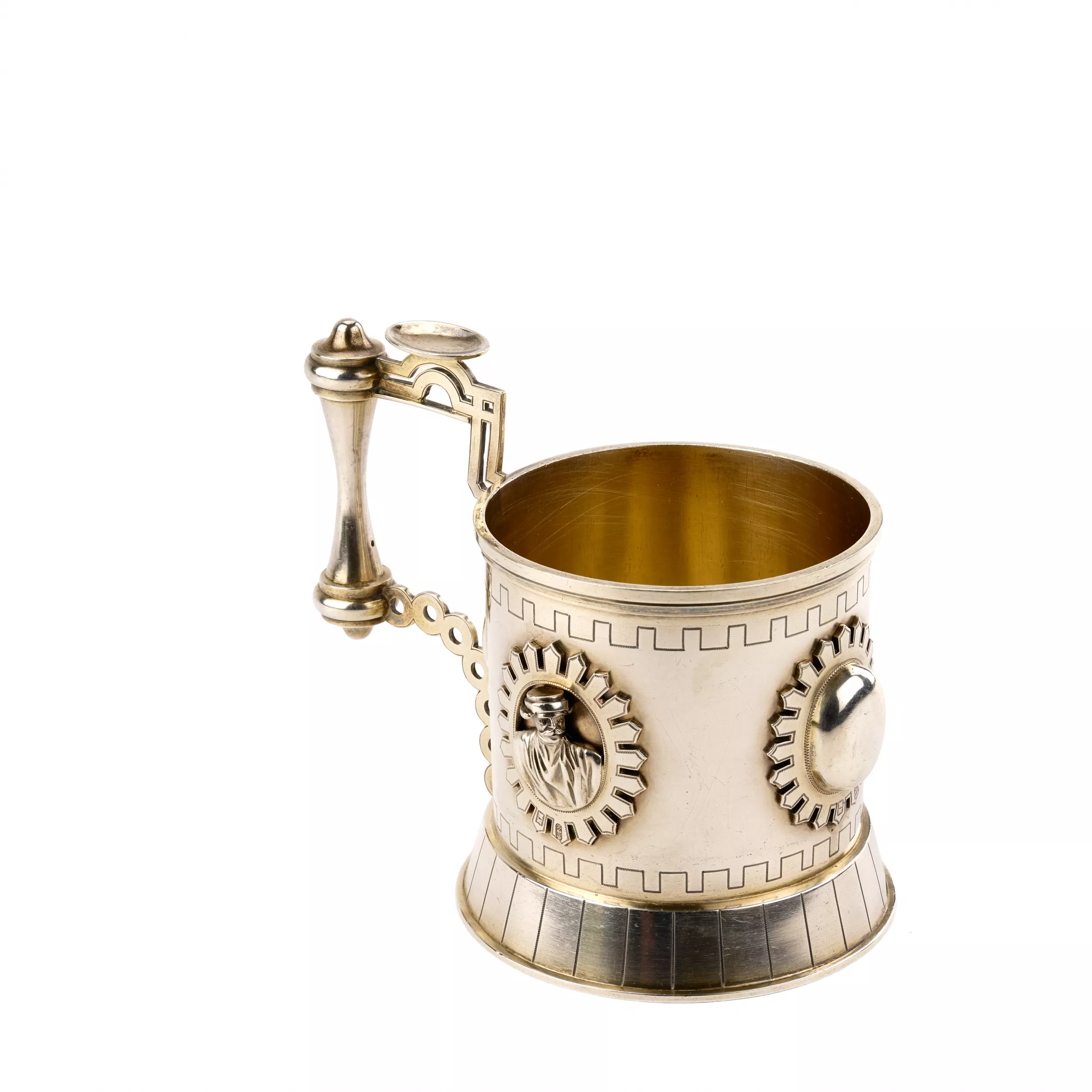 SILVER TEA GLASS HOLDER WITH RELIEF MEDALLIONS IN THE NEO-RUSSIAN STYLE. ST PETERSBURG, 1879