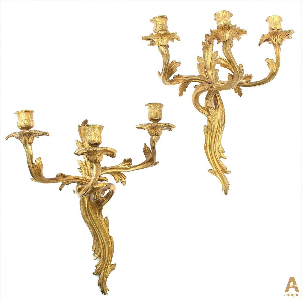 A pair of gilt bronze sconces