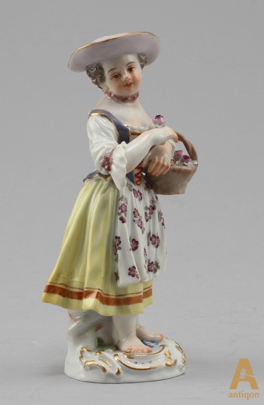 Girl with a basket of flowers. Meissen