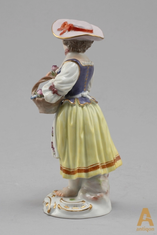 Girl with a basket of flowers. Meissen
