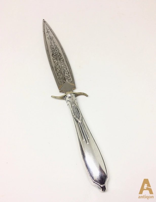 Silver knife for letters.
