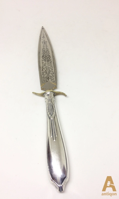 Silver knife for letters.